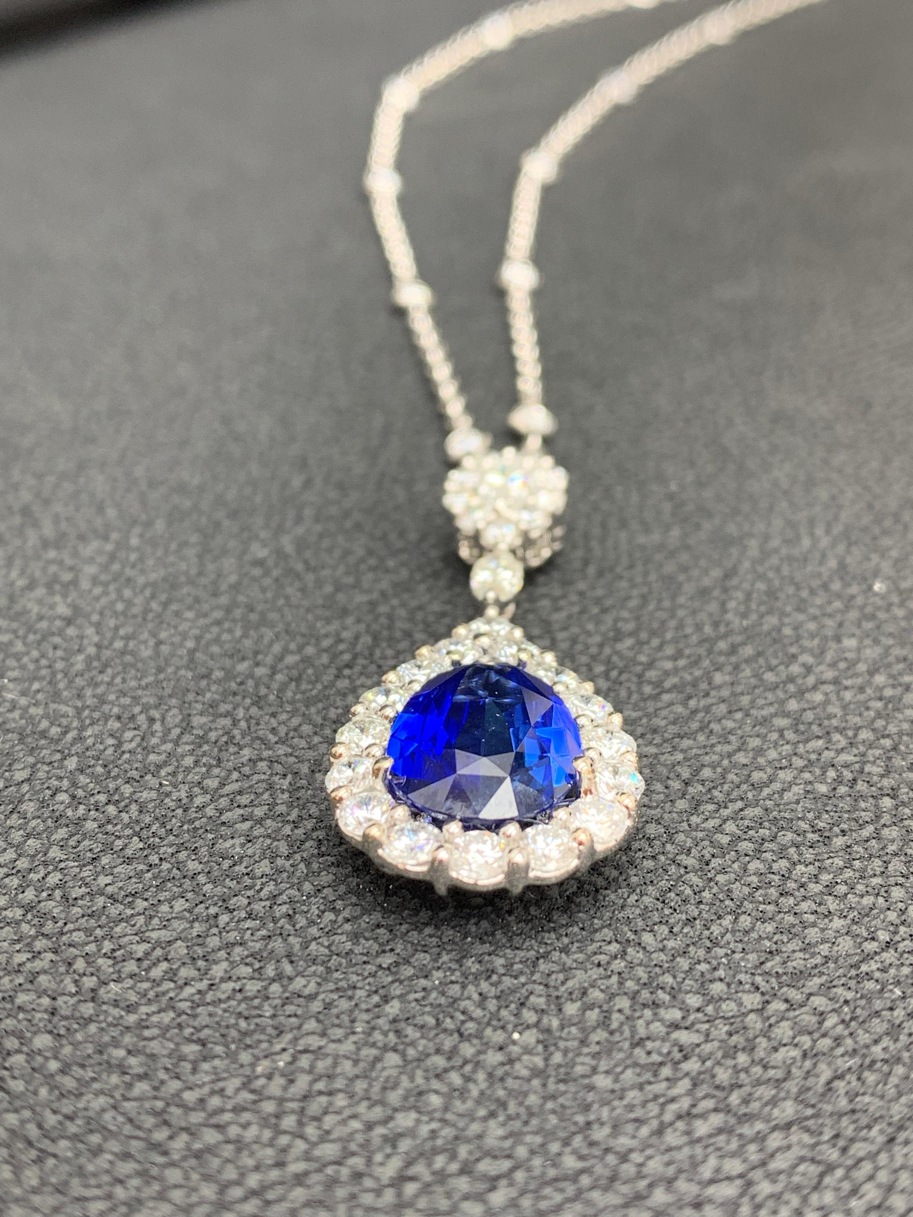 5.10 Carat Pear Shape Blue Saphire and Diamond Halo Drop Pendant Necklace For Sale 1