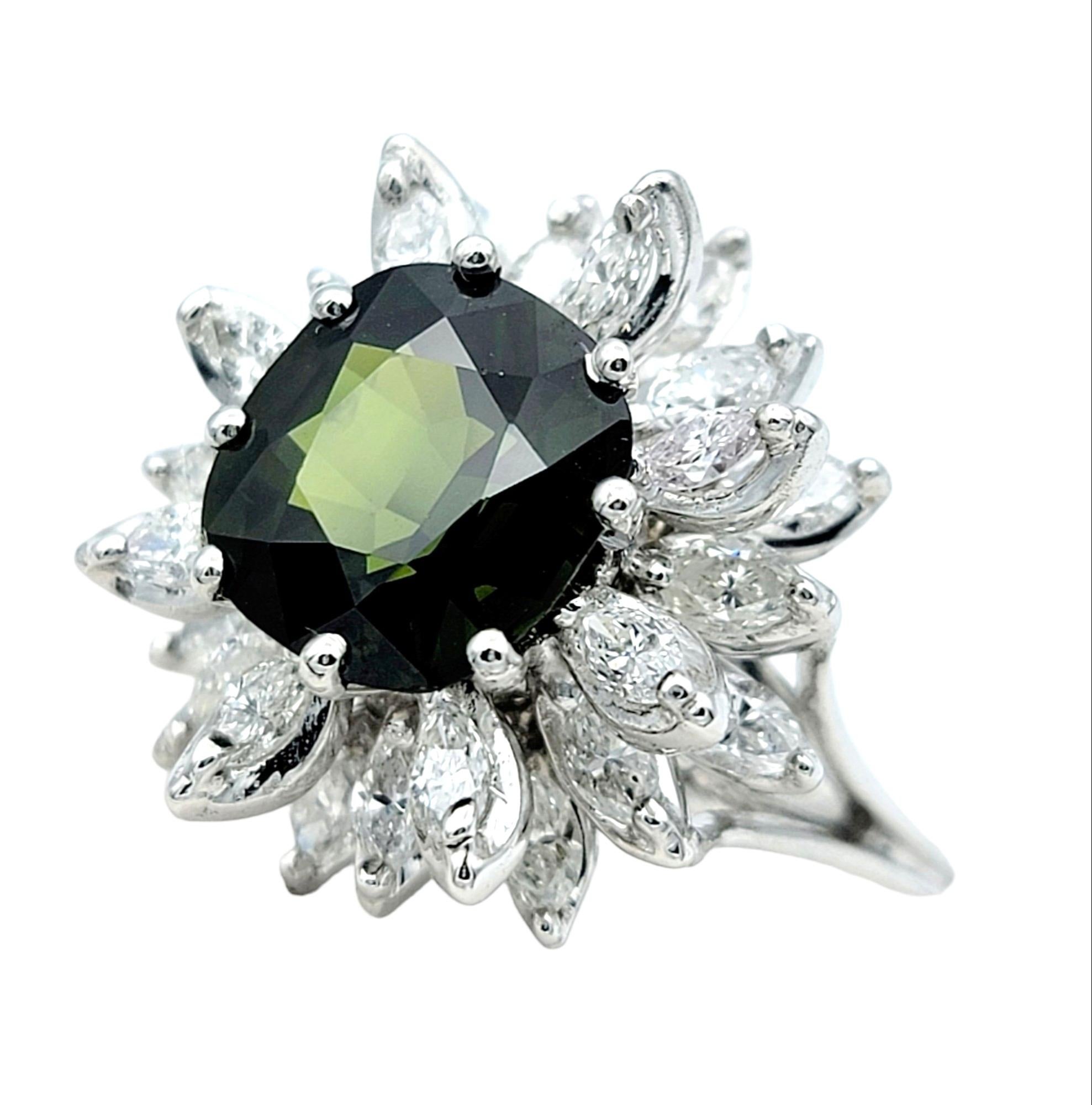 Ring size: 5

This incredible green sapphire and diamond flower cocktail ring is jeweled masterpiece. Crafted in luxurious 14 karat white gold, this stunning ring captures the essence of beauty and grace in every facet.

At its heart, a captivating