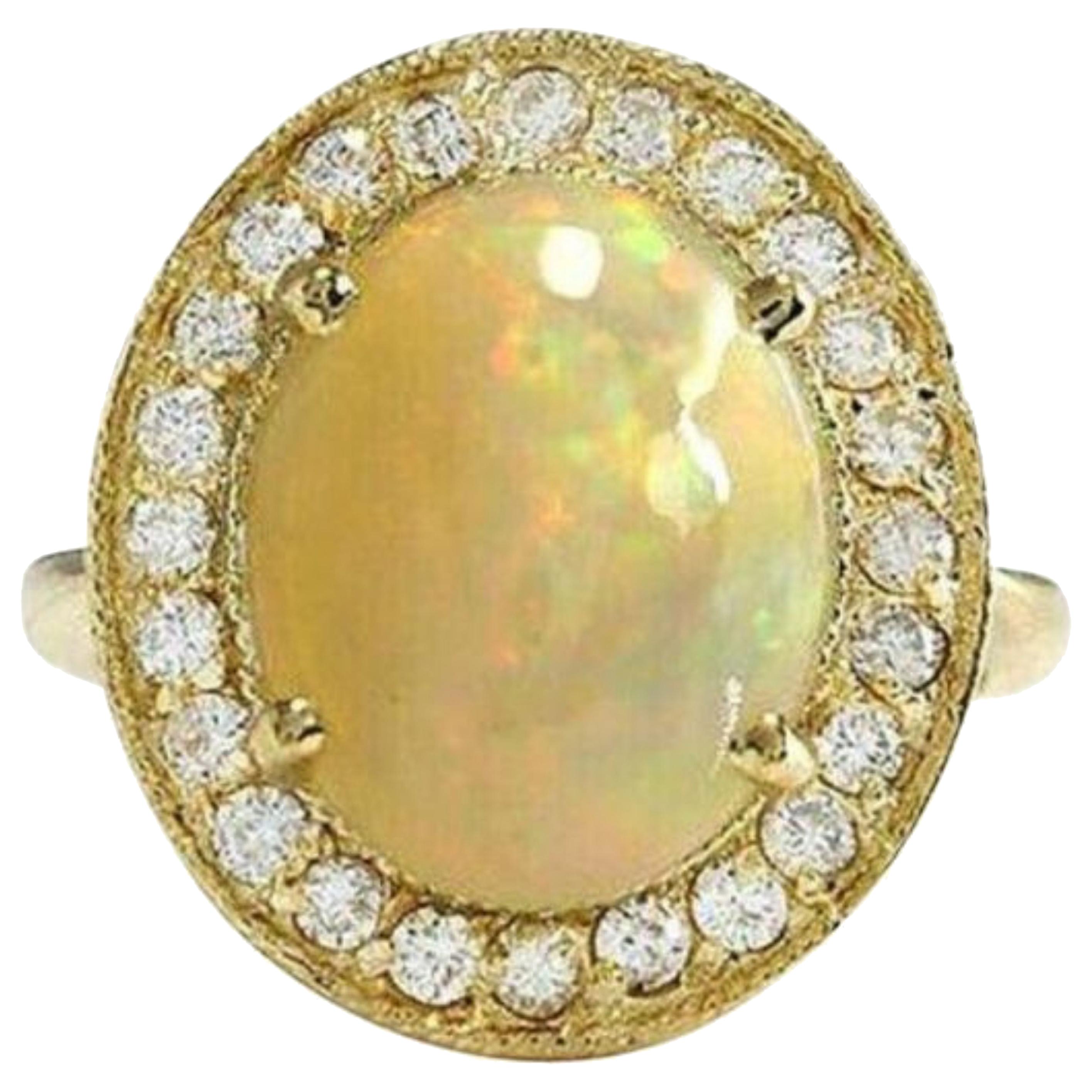 Anillo de oro amarillo macizo de 14 quilates con un impresionante ópalo etíope natural de 5,10 quilates y diamantes
