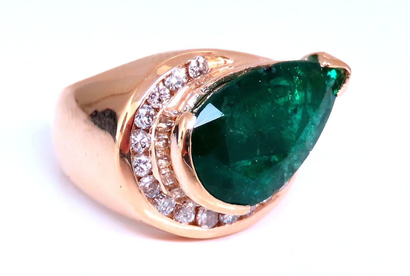 Pear Cluster.

5.10ct. Natural Emerald Ring

Pear cut

12 x 9 mm emerald.

Semi Transparent

14kt. yellow gold

9.7 grams

Ring Current size: 7

Depth of ring: 8mm

14mm wide

$6000 Appraisal Certificate to accompany

(Free Resize Service, Please