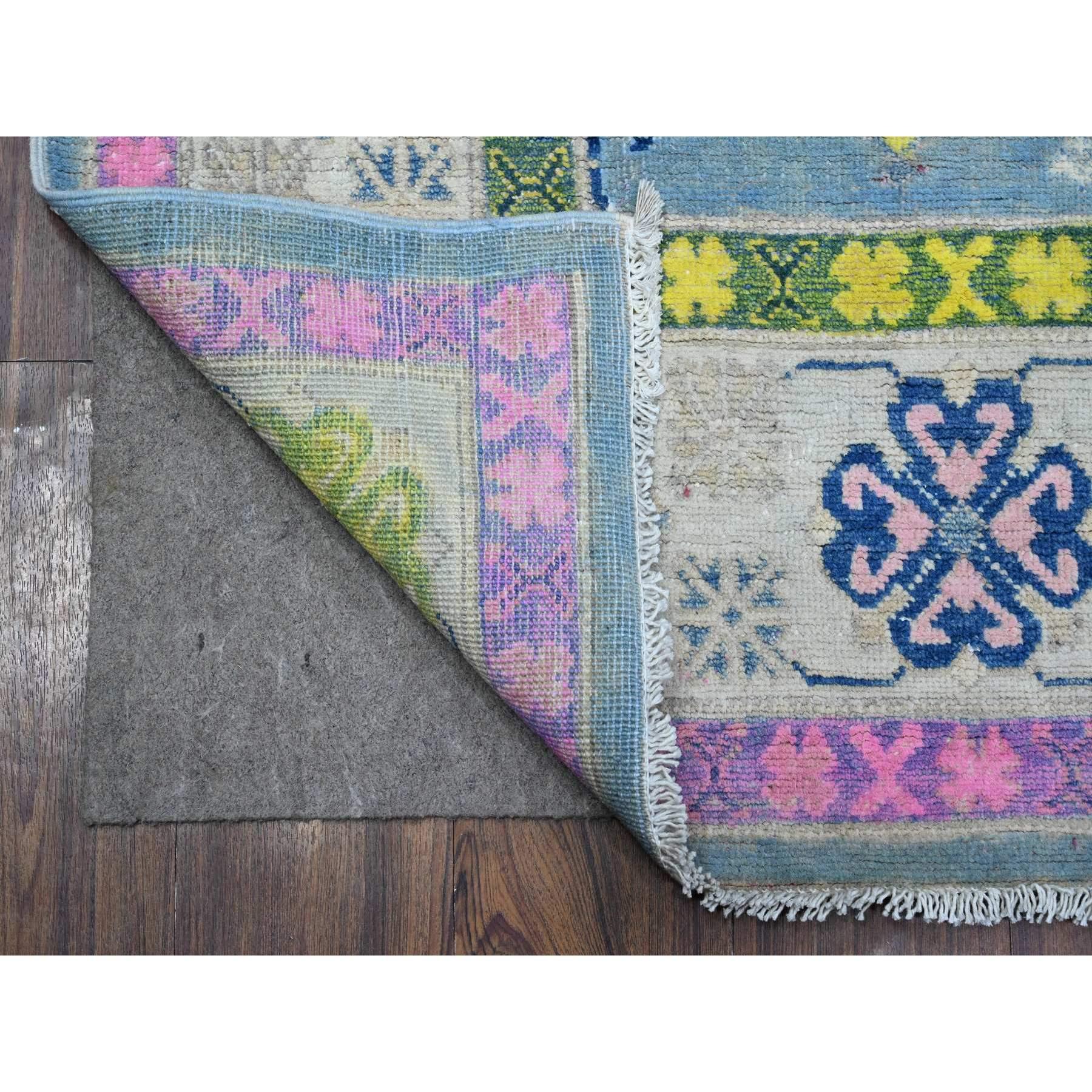 This is a truly genuine one-of-a-kind Fusion Kazak, Hand Knotted, Pure Wool, Oriental Rug. It has been Knotted for months and months in the centuries-old weaving craftsmanship techniques by expert artisans.
Primary materials: Wool
Latex: No Pile