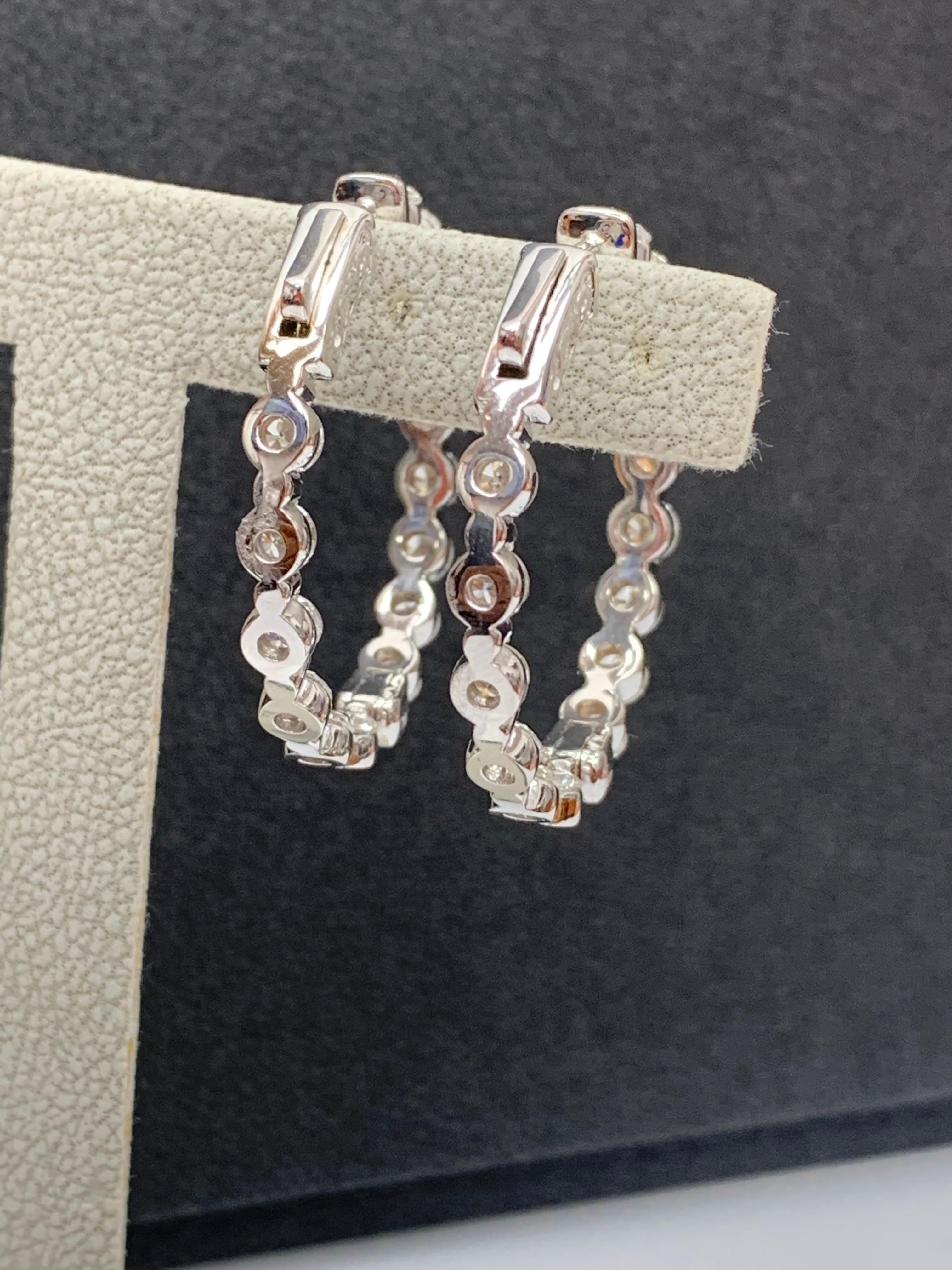 Modern 5.11 Carat Brilliant cut Round Diamond Hoop Earrings in 14K White Gold For Sale