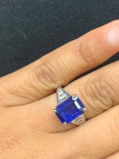 5.11 Carat Emerald Cut Blue Sapphire and Diamond Engagement Ring in Platinum