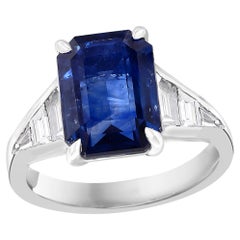 5.11 Carat Emerald Cut Blue Sapphire and Diamond Engagement Ring in Platinum