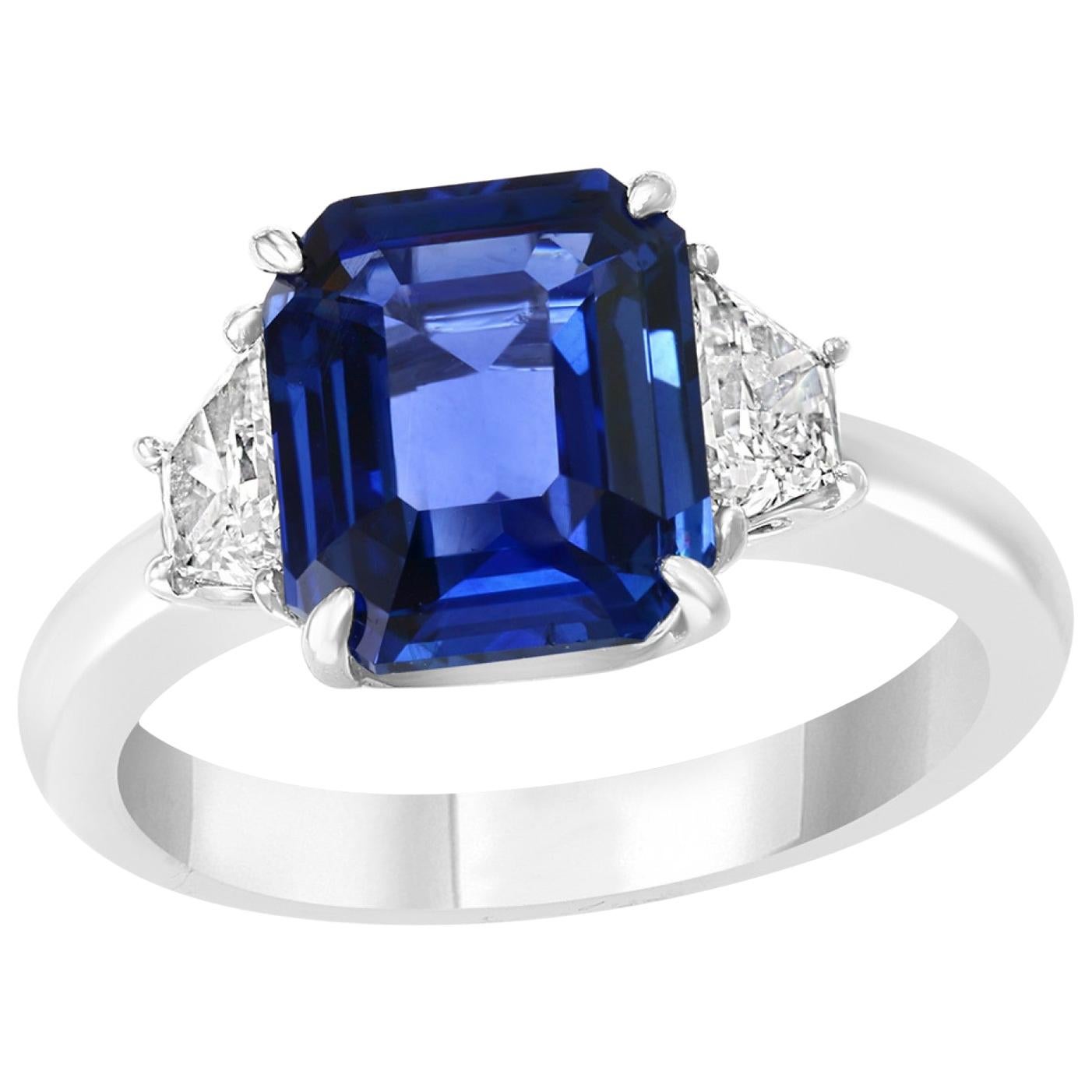 5.11 Carat Emerald Cut Sapphire with Two Accent Diamonds Totaling .52 Carat For Sale