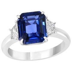 5.11 Carat Emerald Cut Sapphire with Two Accent Diamonds Totaling .52 Carat