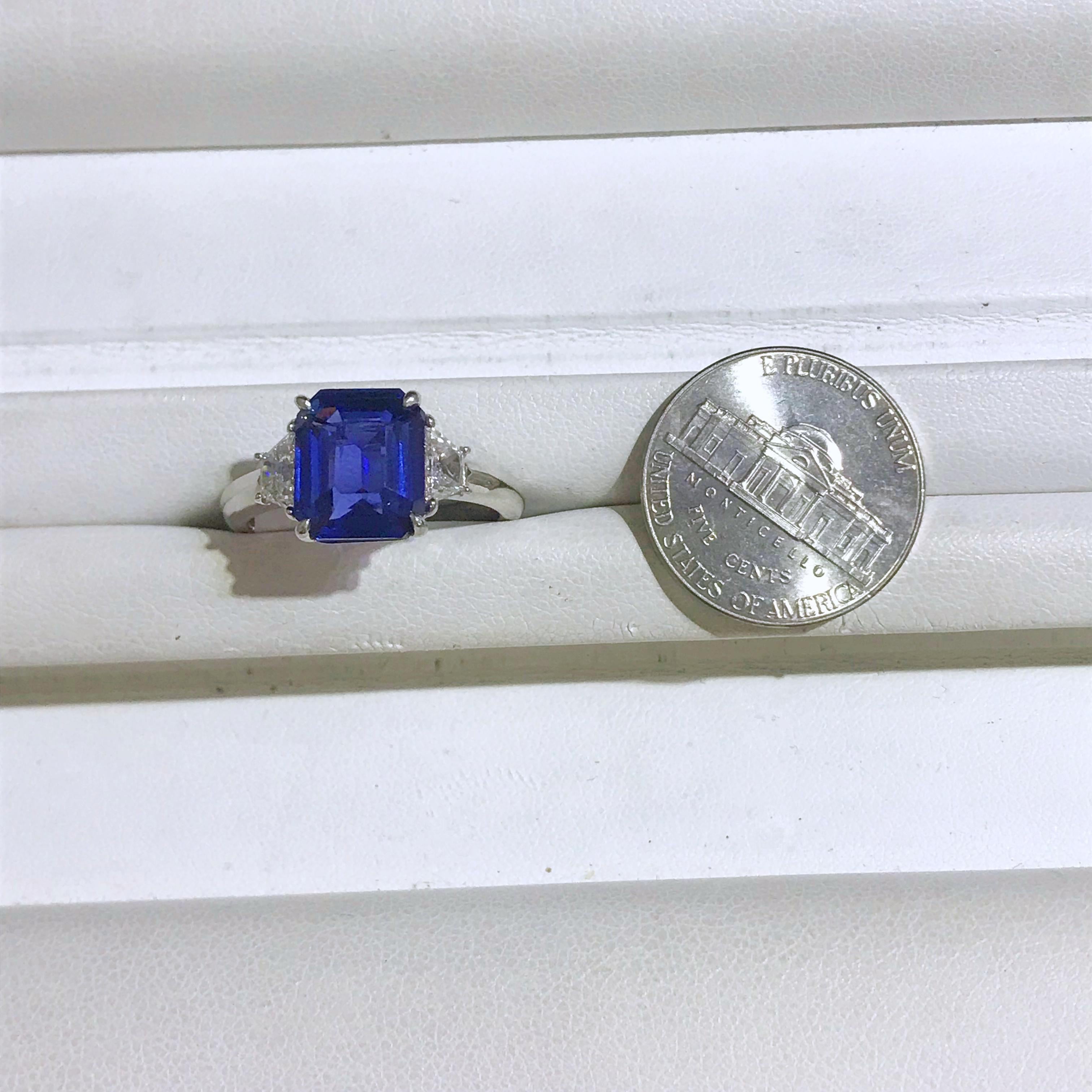 5.11 Carat Emerald Cut Sapphire with Two Accent Diamonds Totaling .52 Carat In New Condition For Sale In New Orleans, LA