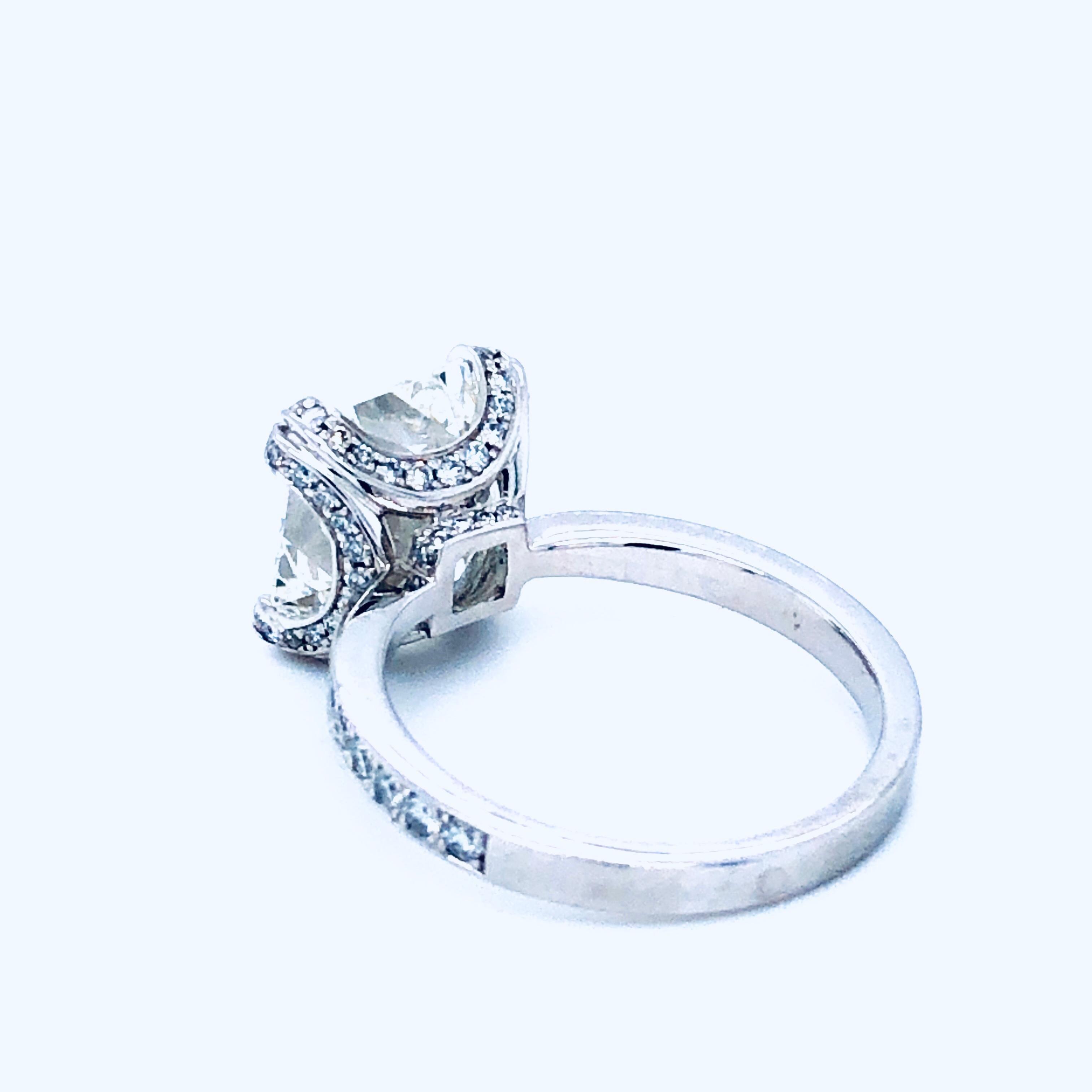 Offered here is an elegant radiant cut diamond engagement ring set in platinum.

Diamond: natural 5.11 radiant cut diamond 
Gia cert# 16226237 color:H clarity: VVs1 Measurements: 10.27 x 9.55 x 6.10 mm depth: 63.9% table: 72%
Girdle: extremely thin