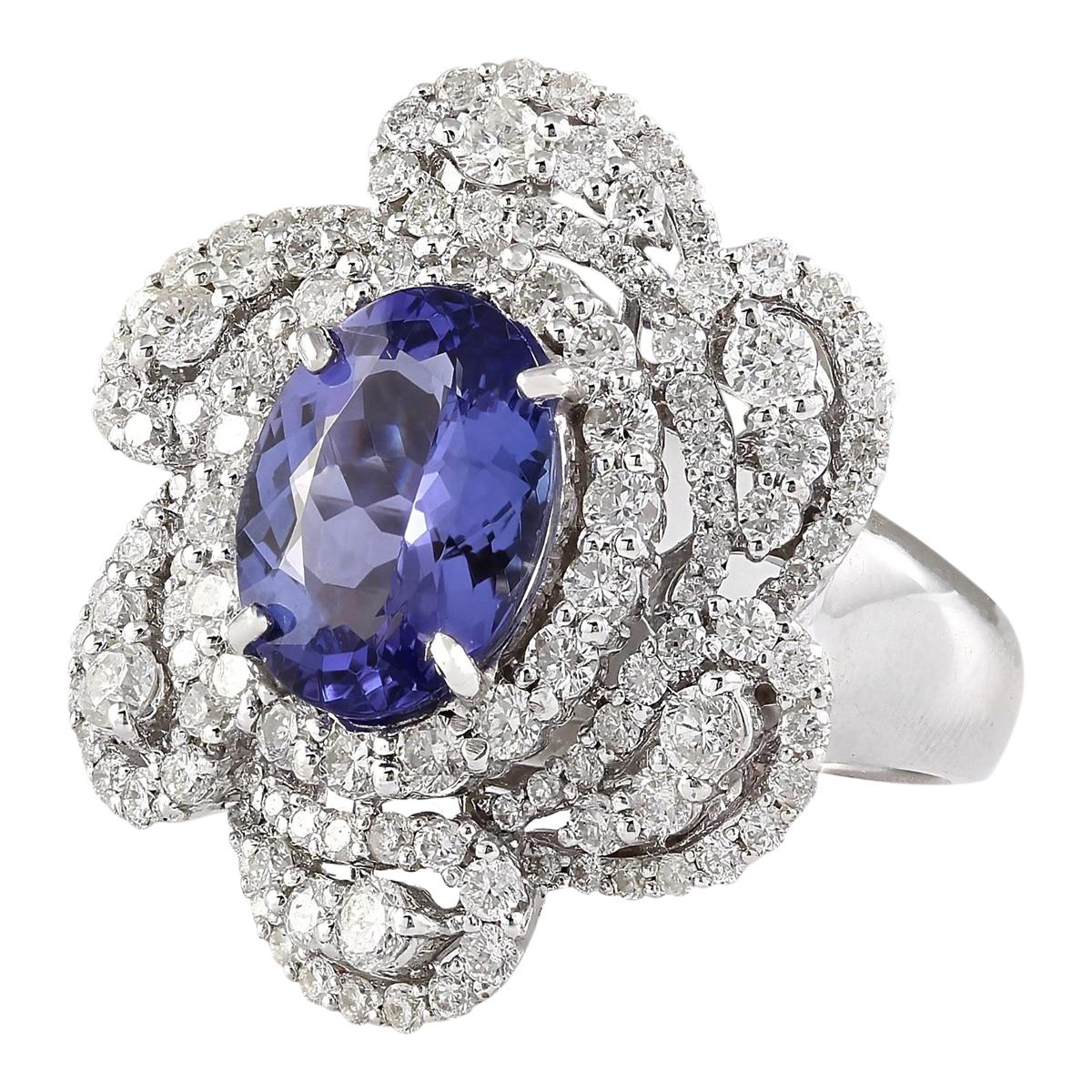 Indulge in luxury with our exquisite 14K White Gold Diamond Ring featuring a stunning 5.11 Carat Tanzanite centerpiece. Crafted with precision and elegance, this ring boasts a total metal weight of 10.5 grams, ensuring durability and sophistication.