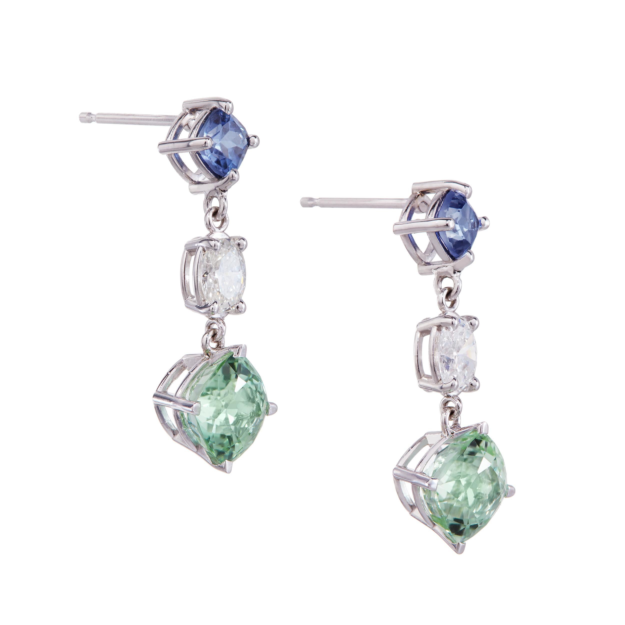 These earrings were made as part of a set with a coordinating necklace that can be found listed separately.

Matched Pair Cushion Cut Tourmaline Weighing:  3.27 Carats
Matched Pair Oval-shaped Diamonds Weighing:  0.86 Carats
Matched Pair Cushion Cut