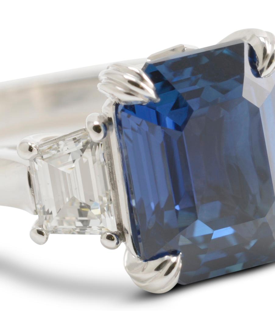 Modern 5.12 Carat Natural Emerald Cut Vivid Blue Sapphire and Diamond Three-Stone Ring For Sale