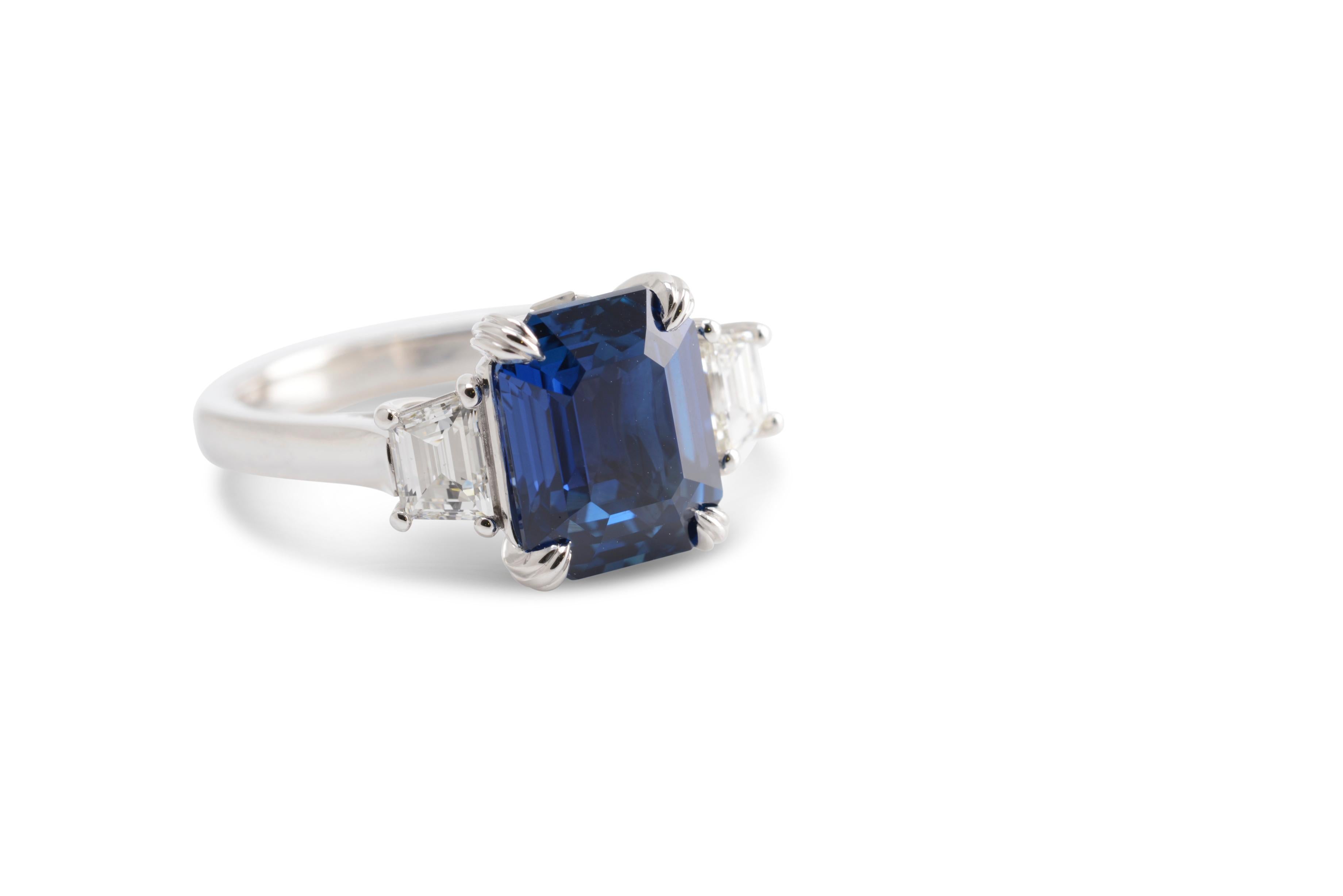 5.12 Carat Natural Emerald Cut Vivid Blue Sapphire and Diamond Three-Stone Ring In New Condition For Sale In Sydney, NSW
