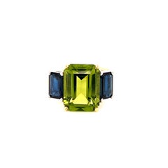 5 Carat Peridot and Blue Sapphire Three-Stone Ring in White and Yellow Gold