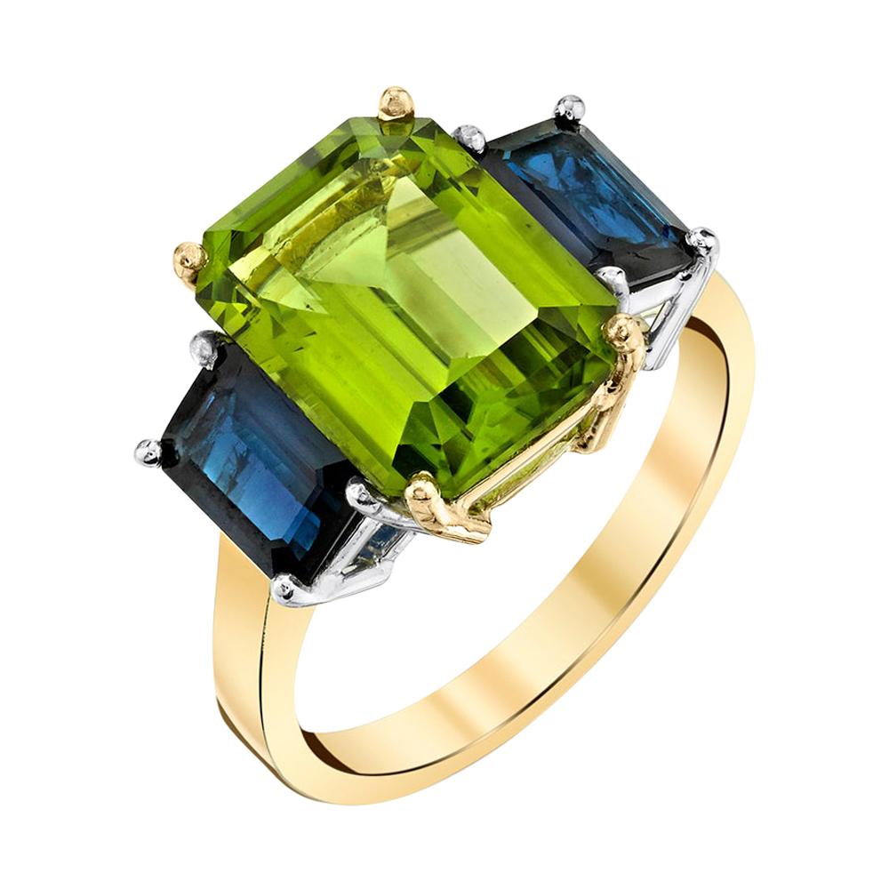 5 Carat Peridot and Blue Sapphire Three-Stone Ring in White and Yellow Gold  For Sale