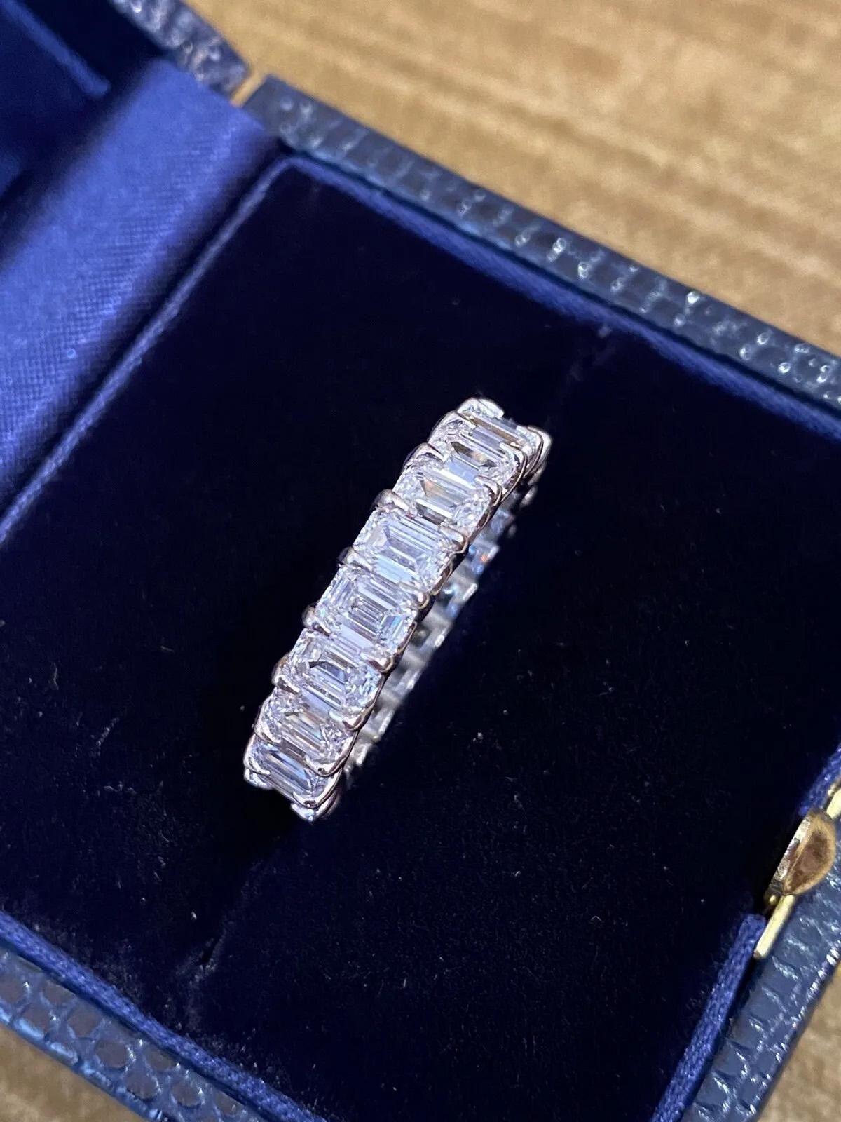 Modern 5.12 Carat Total Emerald Cut Diamond Eternity Band Ring in Platinum 5mm 6.25 For Sale