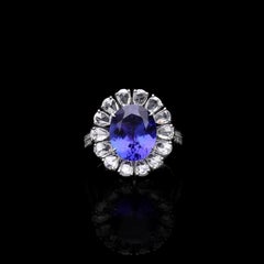 5.12 carats Oval Tanzanite 2.13 carats diamonds 18K White Gold Ring
