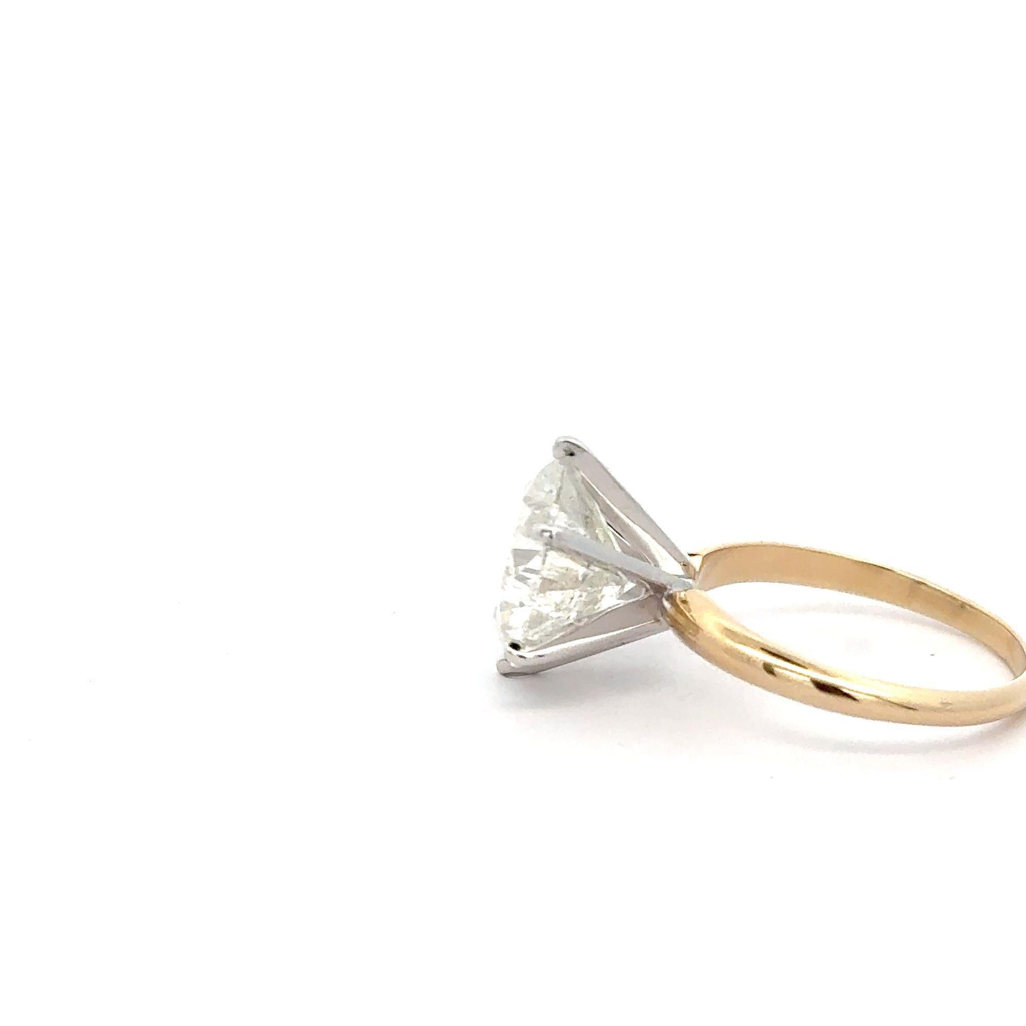 EGL Certified 5.13 Carat Round Cut Diamond Two-Tone Engagement Ring in Size 6.5

Details:
Item Type: Engagement Ring
Metal: 14K Two-Tone Gold (Yellow and White Gold)
Size: 6.5
Weight: 3.60 grams

Center Stone Details:
Type: Natural Round Brilliant