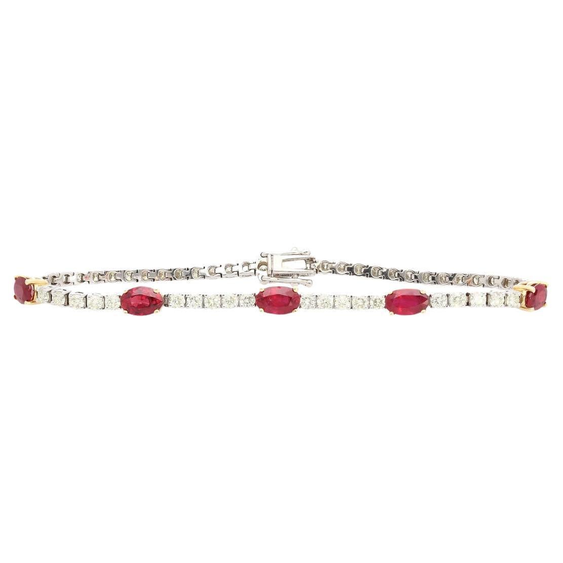 Natural 2.80 carat Ruby and 2.33 carat Diamond bracelet in 18K White Gold. A must-have for any nuanced fine jewelry collection. Featuring round-cut diamonds and oval-cut rubies, this 6.75-inch bracelet is the perfect combination of classic elegance