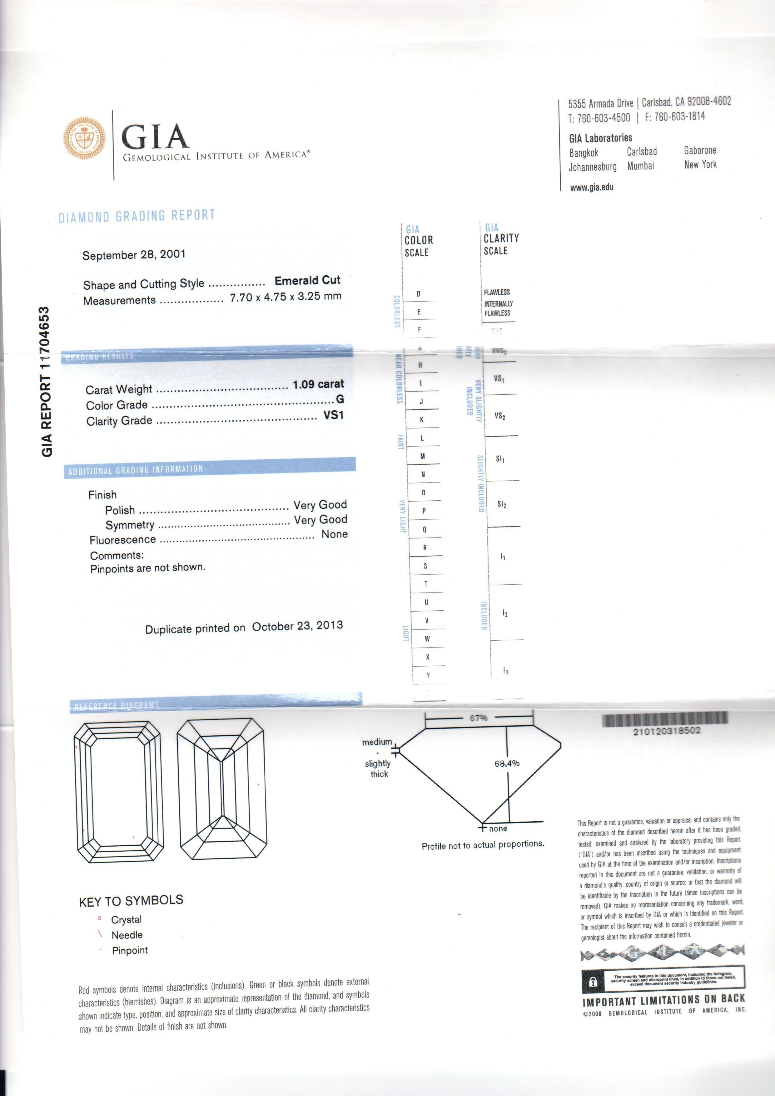 5.13 Carat Total Weight 3-Stone Emerald Cut Diamond Ring 9