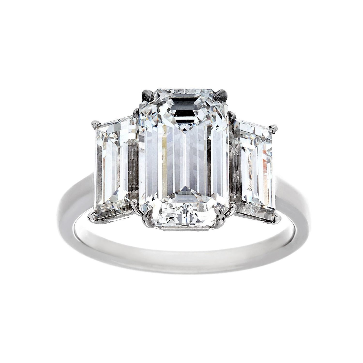 Modern 5.13 Carat Total Weight 3-Stone Emerald Cut Diamond Ring