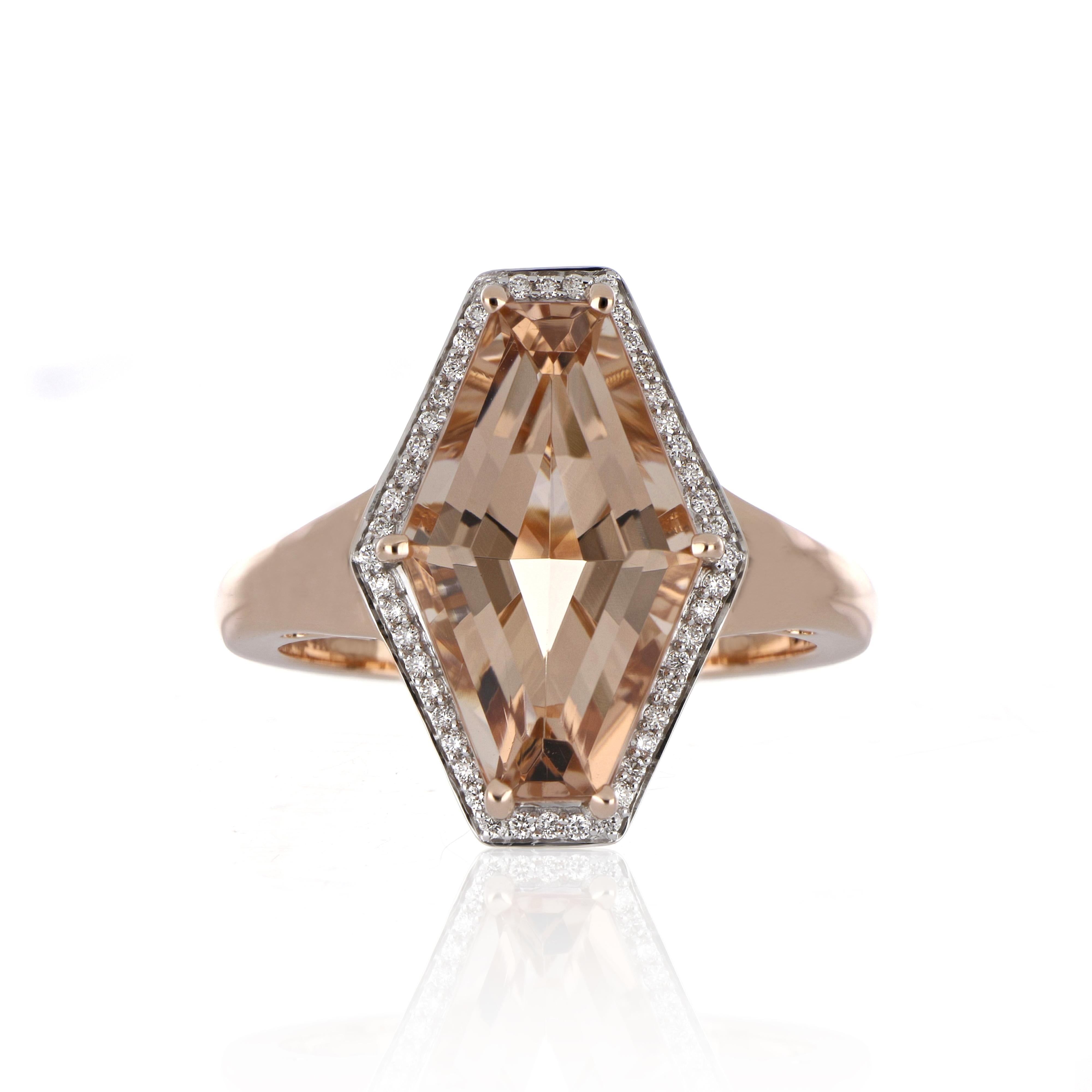 Elegant and exquisitely detailed Cocktail 14K Ring, centre set with 5.13 Cts. Fancy Hexagon Cut Morganite. Surrounded with Diamonds, weighing approx. 0.12 ct. Beautifully Hand crafted in 14 Karat Rose Gold.

Stone Size:
Morganite: 16 x 10