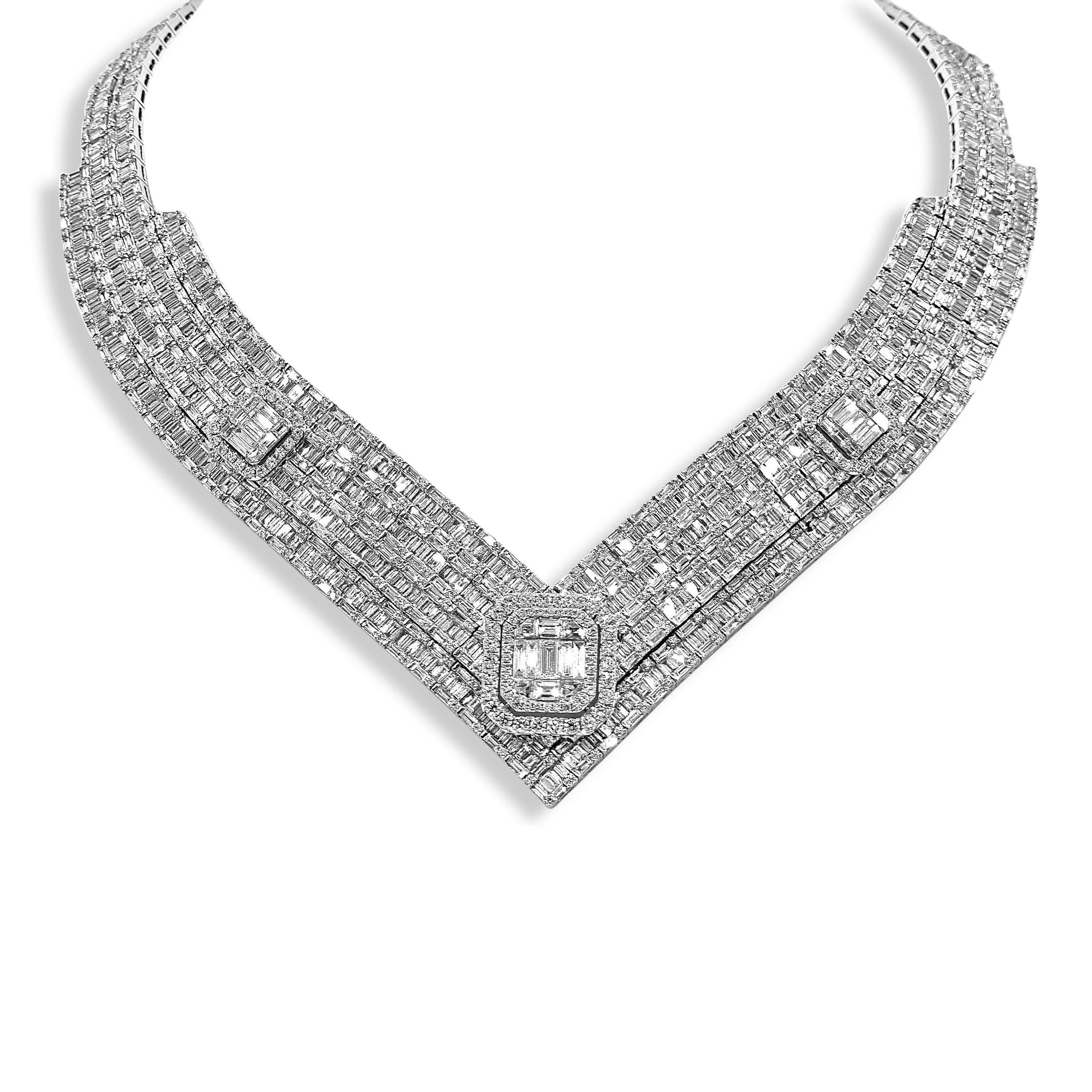 656 White Round Diamonds: 9.11 Carats
1763 Baguette Diamonds: 42.21 Carats
Metal: 18K White Gold, 158.77  Grams
