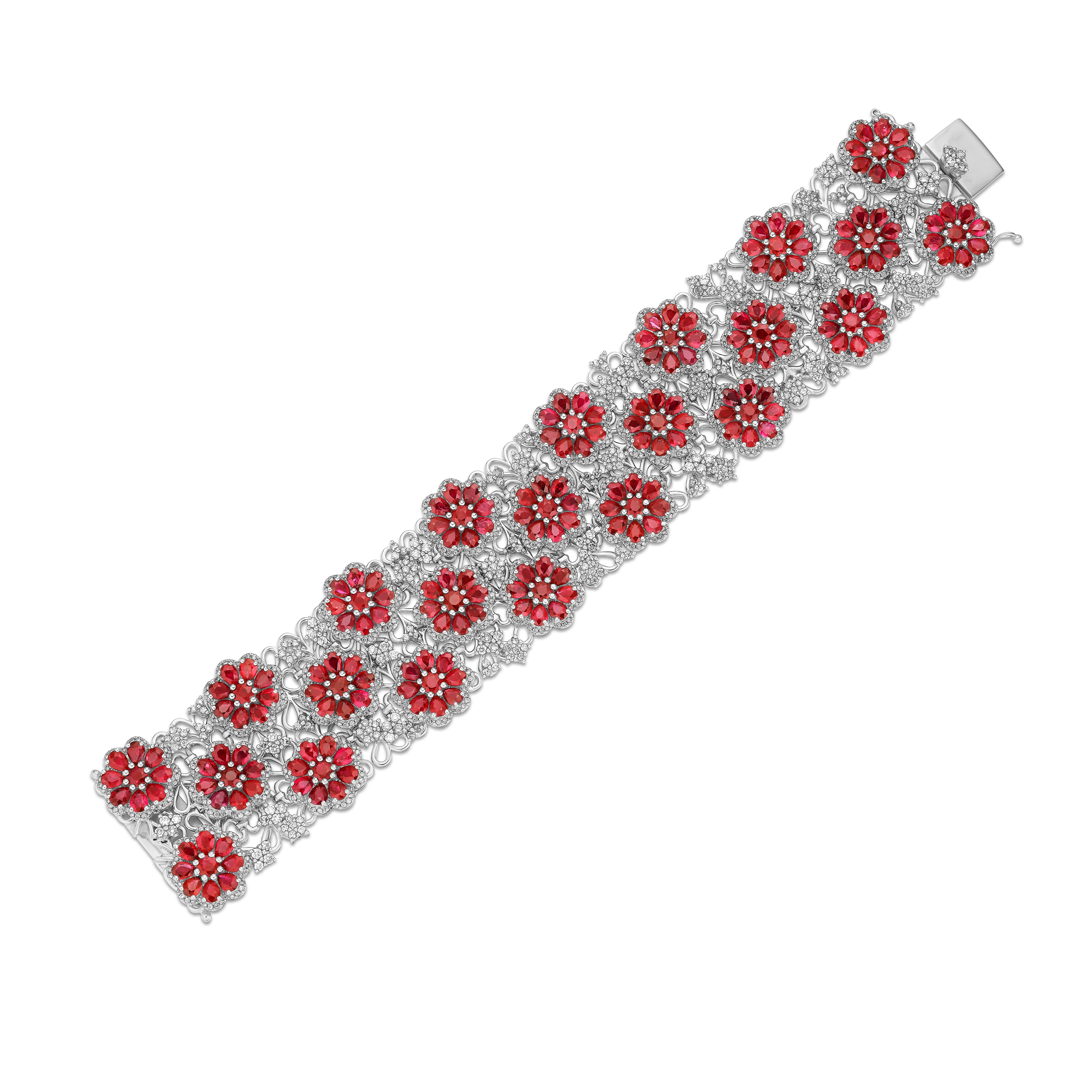 •	A truly exquisite combination of red rubies & white diamond encircles the wrist in this one-of-a-kind bracelet. Comprised with over 50 carats of rubies and diamonds, this bracelet was made to depict the elegance and beauty of nature and florals.