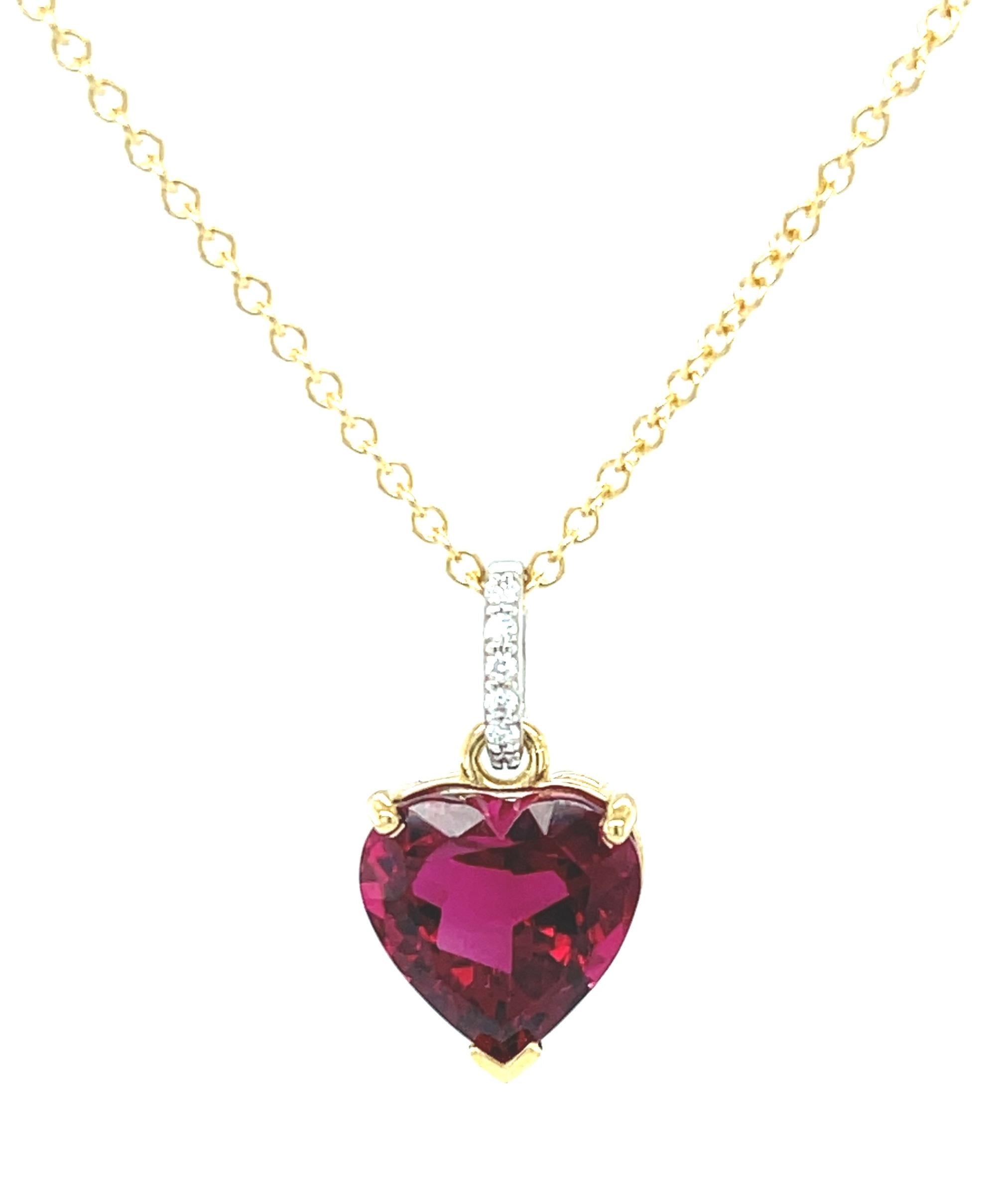 What better way to feel cherished than with a finest quality, heart-shaped gemstone and diamonds? This gorgeous necklace features a stunning 5.14 carat heart-shaped rubellite with breathtakingly rich color - a real gem! Handcrafted in 18k yellow