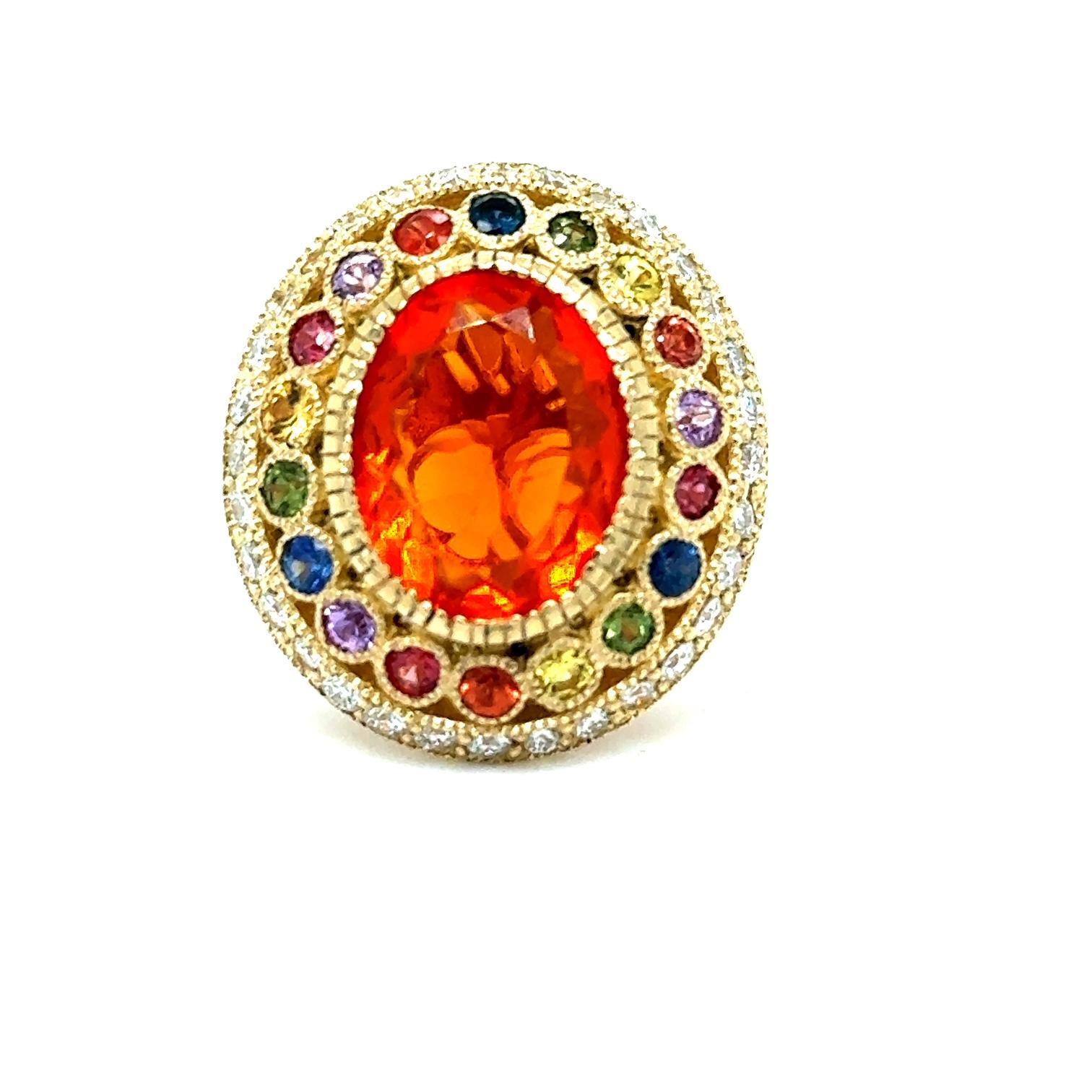 5.14 Carat Natural Fire Opal Sapphire and Diamond Yellow Gold Cocktail Ring

This ring has a beautiful 3.17 Carat Oval Cut Natural Orange Fire Opal as its center stone and is elegantly surrounded by 24 Round Cut Multi-Colored Natural Sapphires that