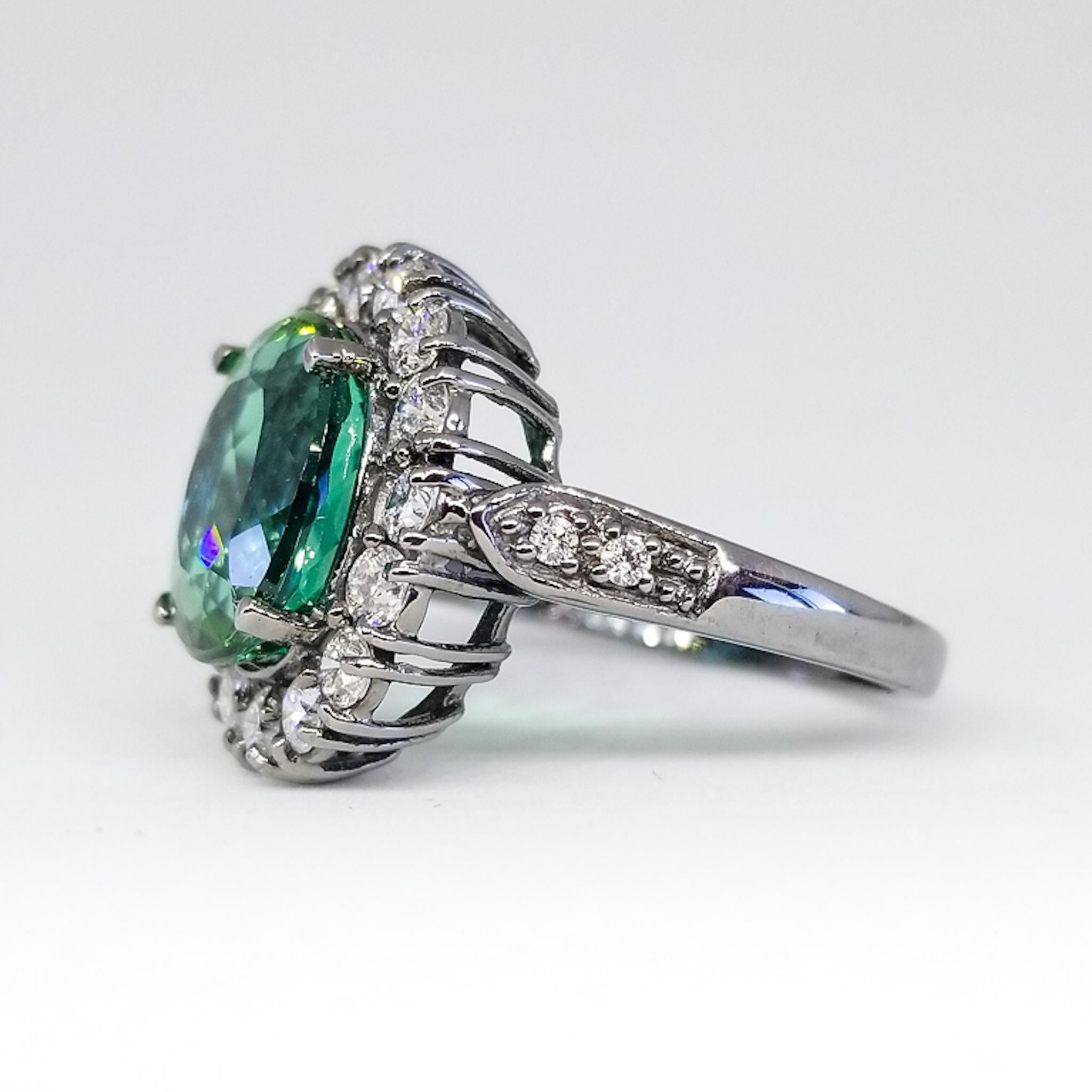 Oval Cut 5.14 Carat Natural Mint Green Tourmaline and 1.70 Carat Diamond Ring Black Gold For Sale