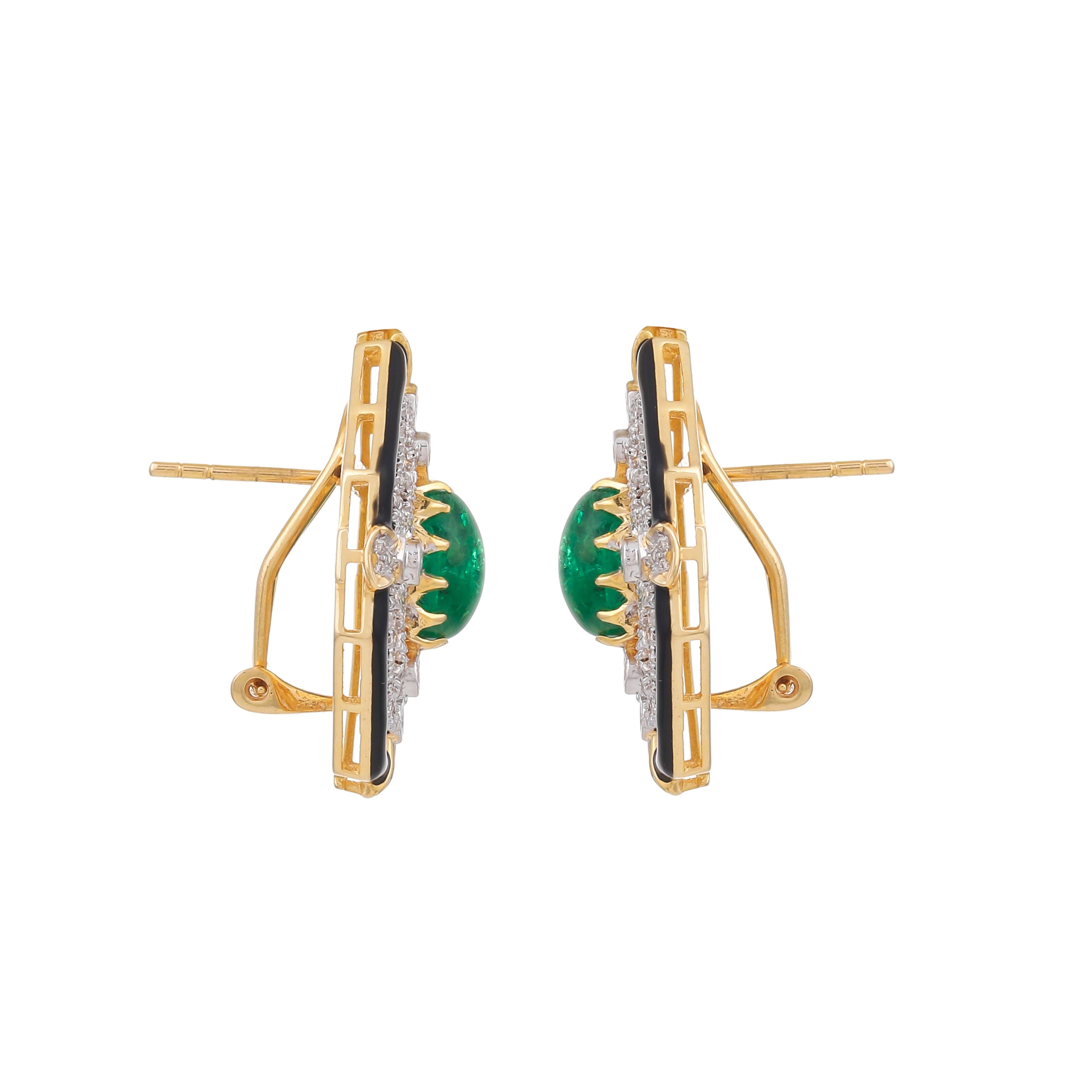 A beguiling beauty to reckon! Featured here is a statement earrings set with oval shaped Zambian emerald cabochon weighing approximately 5.14 carats enhanced with diamonds with a total diamond weight of 0.95 carats in a geometric motif and the black