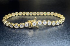 5.40 carat Bezel Set Natural Diamond Tennis Bracelet in 18K Yellow Gold