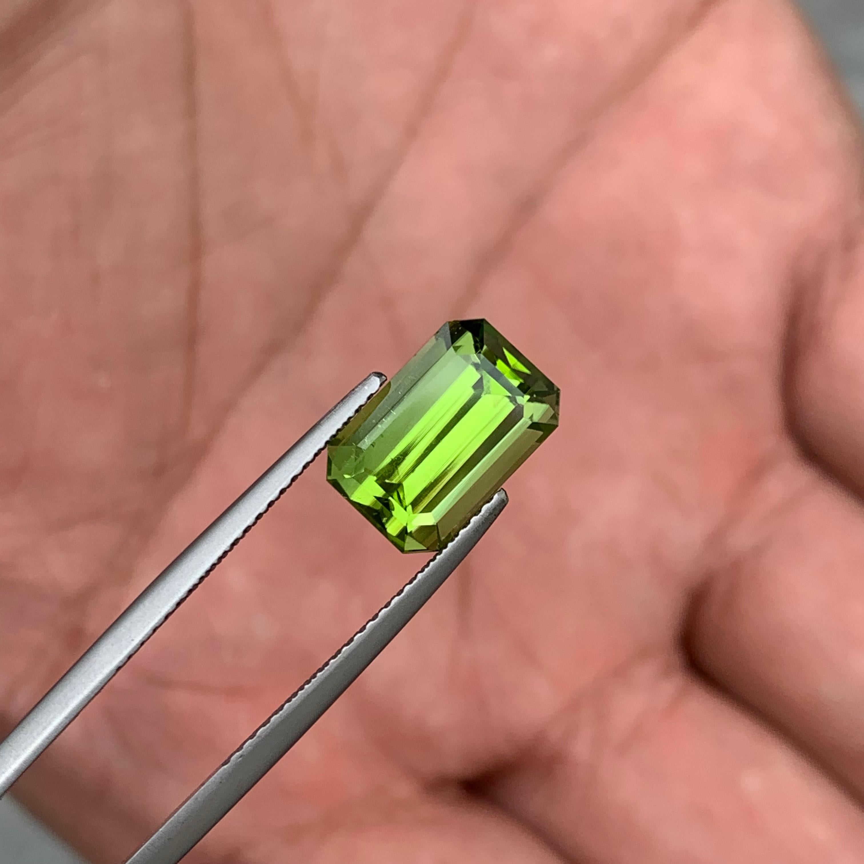 Women's or Men's 5.15 Carat Emerald Cut Faceted Apple Green Peridot Ring Gemstone from Pakistan