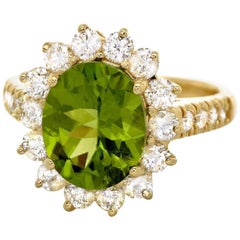 Ring mit 5,15 Karat beeindruckender natürlicher Peridot und Diamant aus 14 Karat Gelbgold
