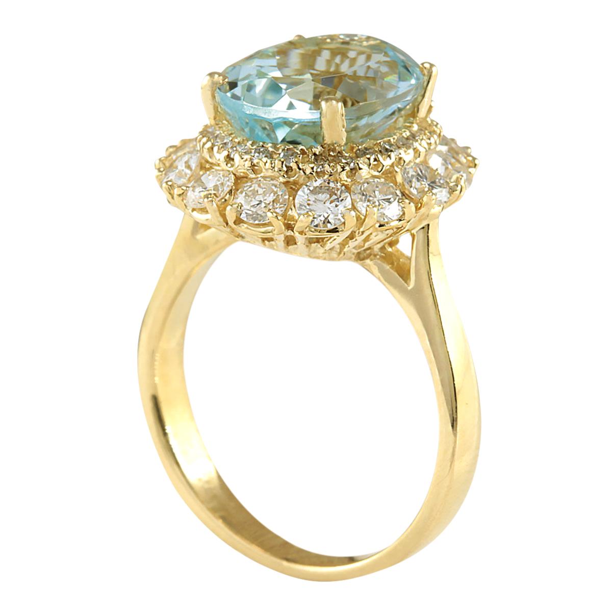Oval Cut Aquamarine Diamond Ring In 14 Karat Yellow Gold  For Sale