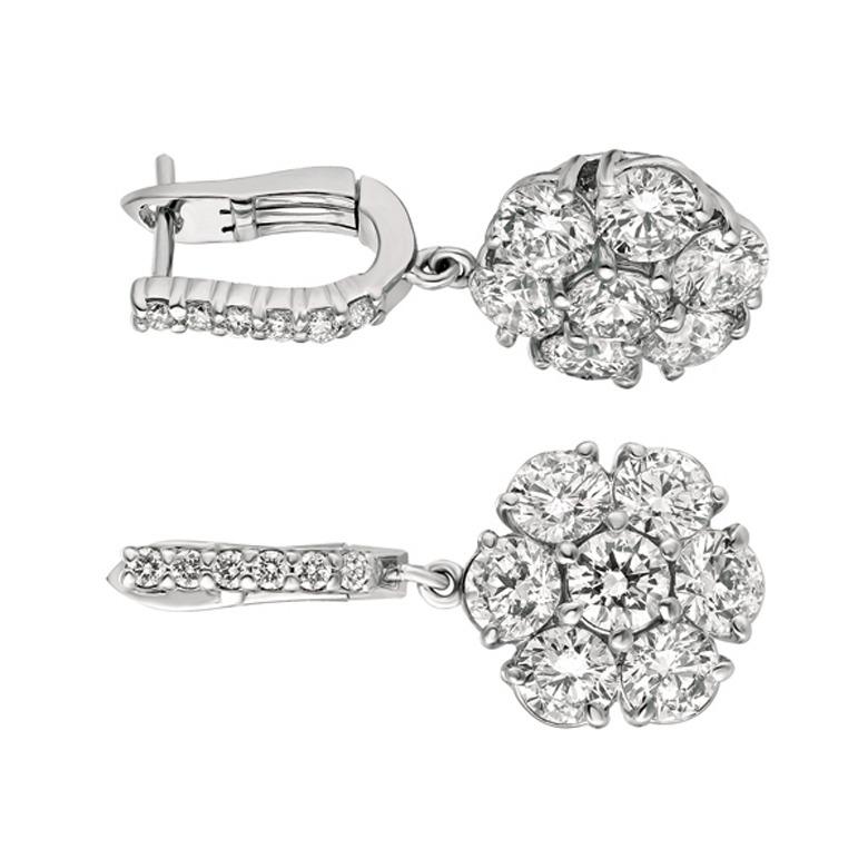 5.15 Carat Natural Diamond Earrings G SI 14K White Gold

100% Natural, Not Enhanced in any way Round Cut Diamond Earrings
5.15CT
G-H 
SI  
14K White Gold  5.5 grams, Prong
1/1/16 inch in height, 1/2 inch in width
14 diamonds  - 4.90ct,  12 diamonds