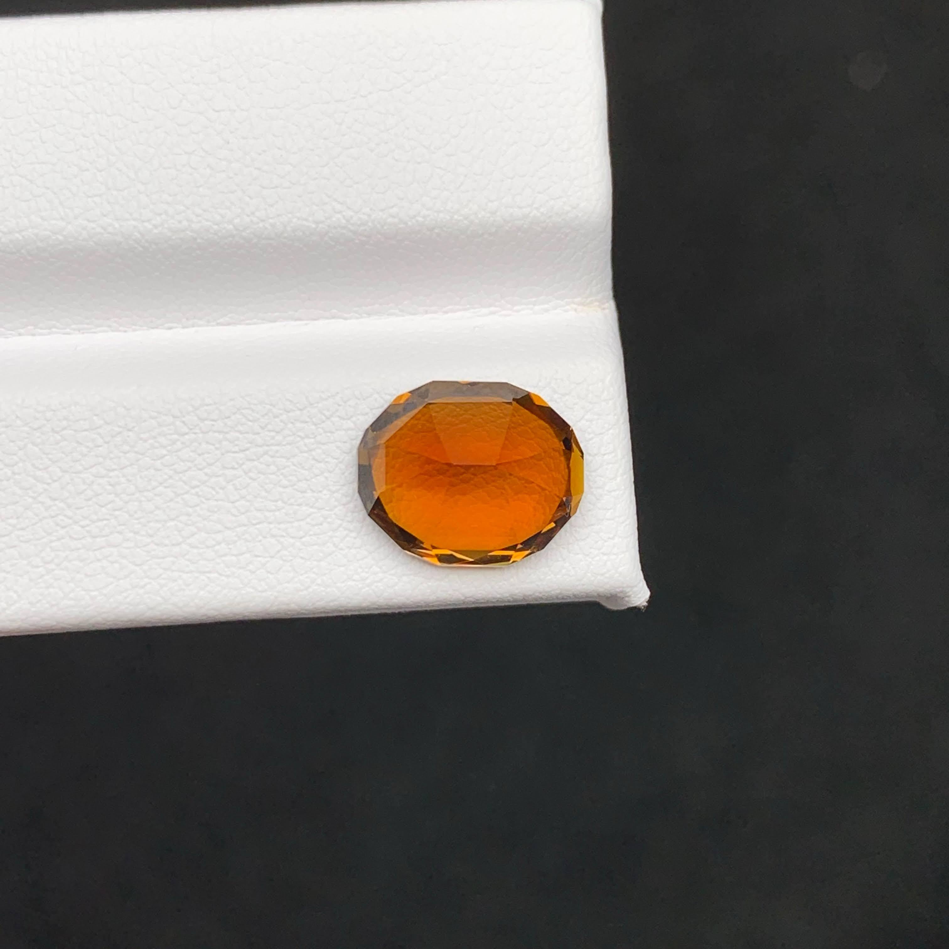 Women's or Men's 5.15 Carat Natural Loose Orange Dravite Tourmaline Oval Cut Brazilian Gemstone For Sale