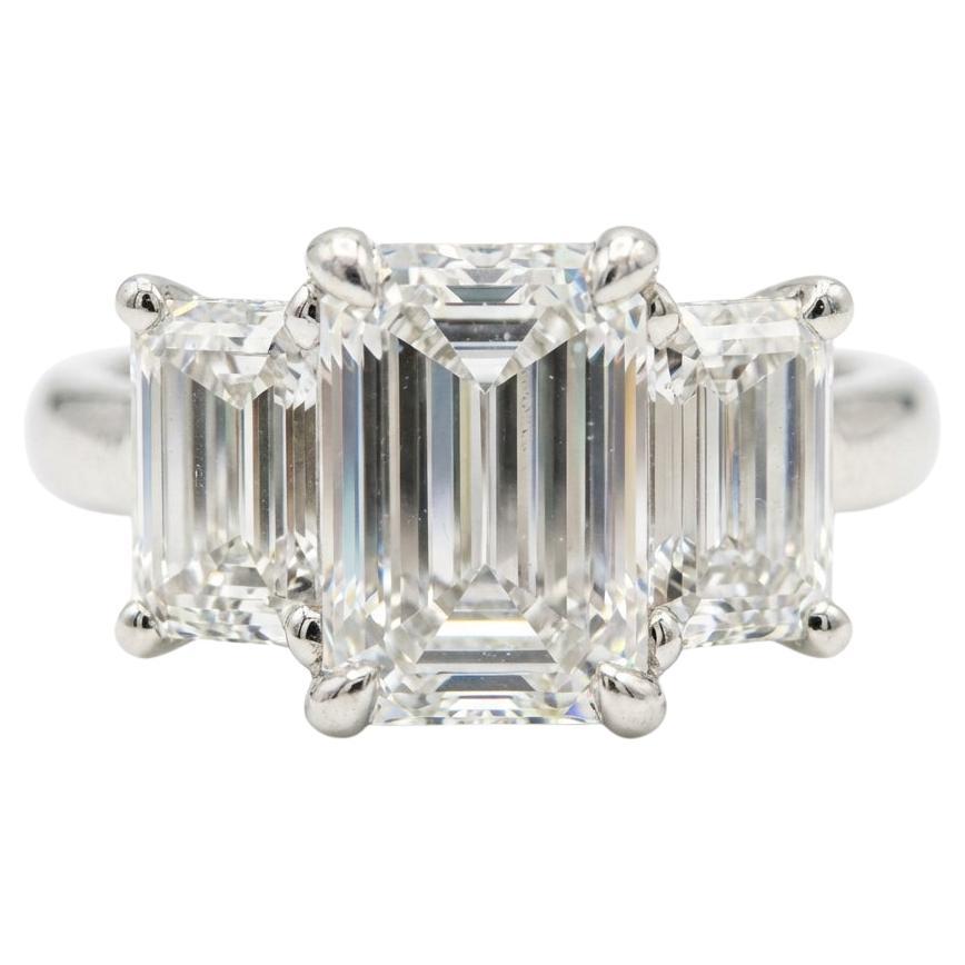 5.15 Carat Three-Stone Emerald Cut Diamond Platinum Ring For Sale