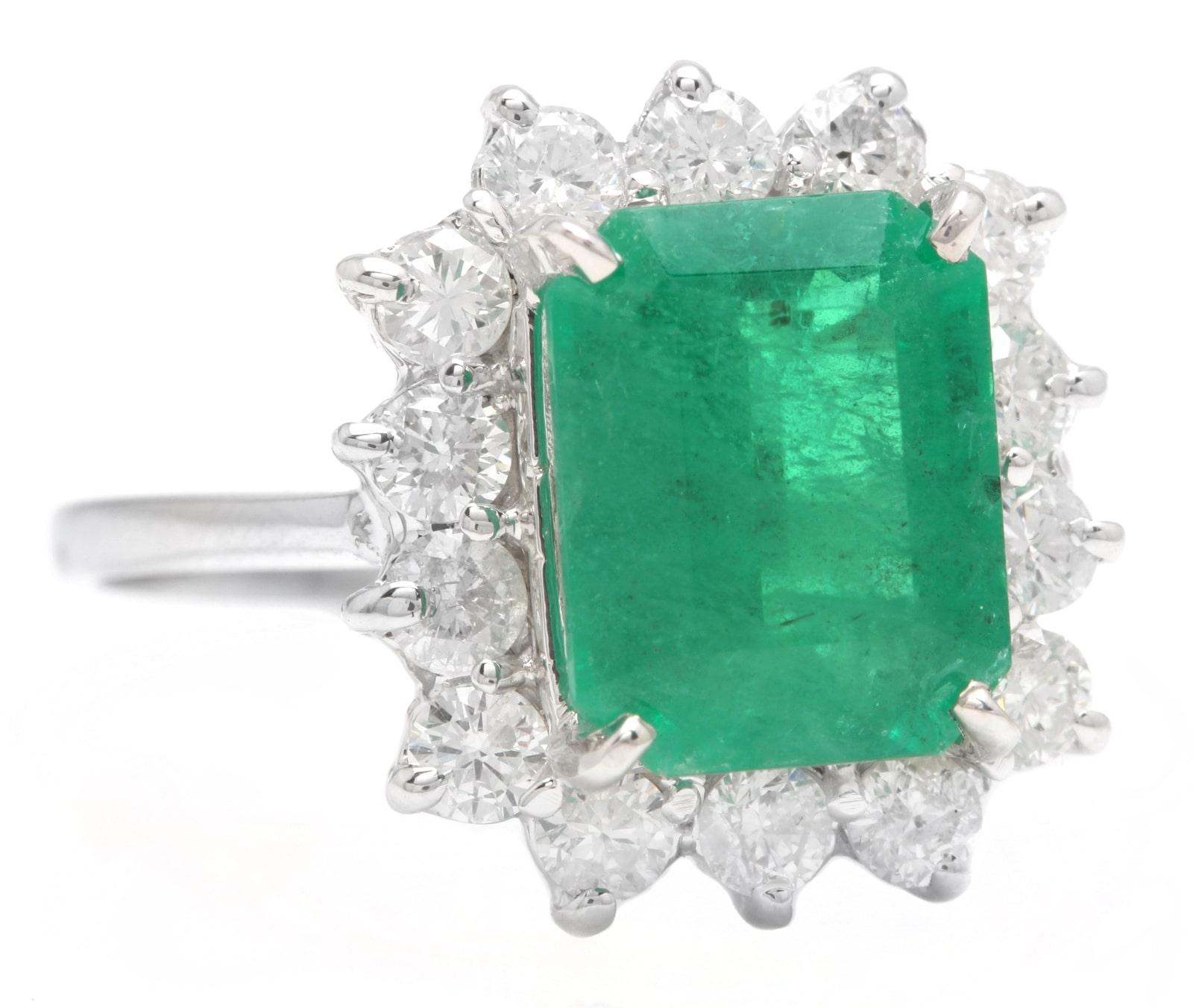 5.15 Carats Natural Emerald and Diamond 14K Solid White Gold Ring

Suggested Replacement Value: Approx. $8,000.00

Total Natural Green Emerald Weight is: Approx. 4.00 Carats

Emerald Measures: Approx. 11 x 8 mm

Natural Round Diamonds Weight: