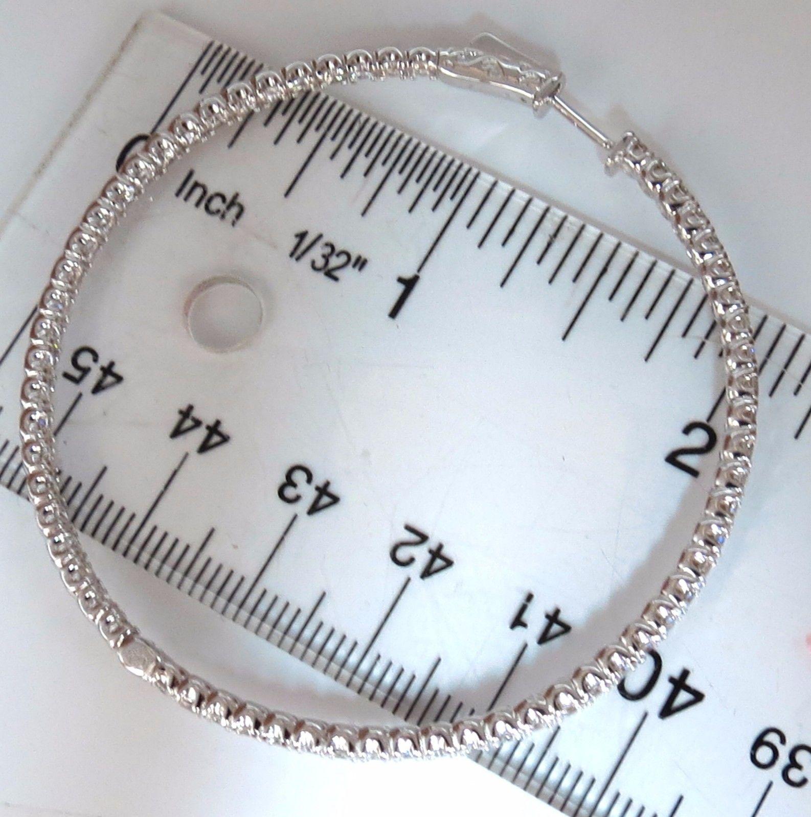 The Extra Large

5.15ct. Natural Round, Brilliant diamonds hoop earrings.

inside / out

H color, VS-2 clarity

Full cuts, great sparkle.

2.2 inch in diameter 

2.7 mm wide

15.2 grams.

14kt. white gold. 

Button press Locking & open

$14,000