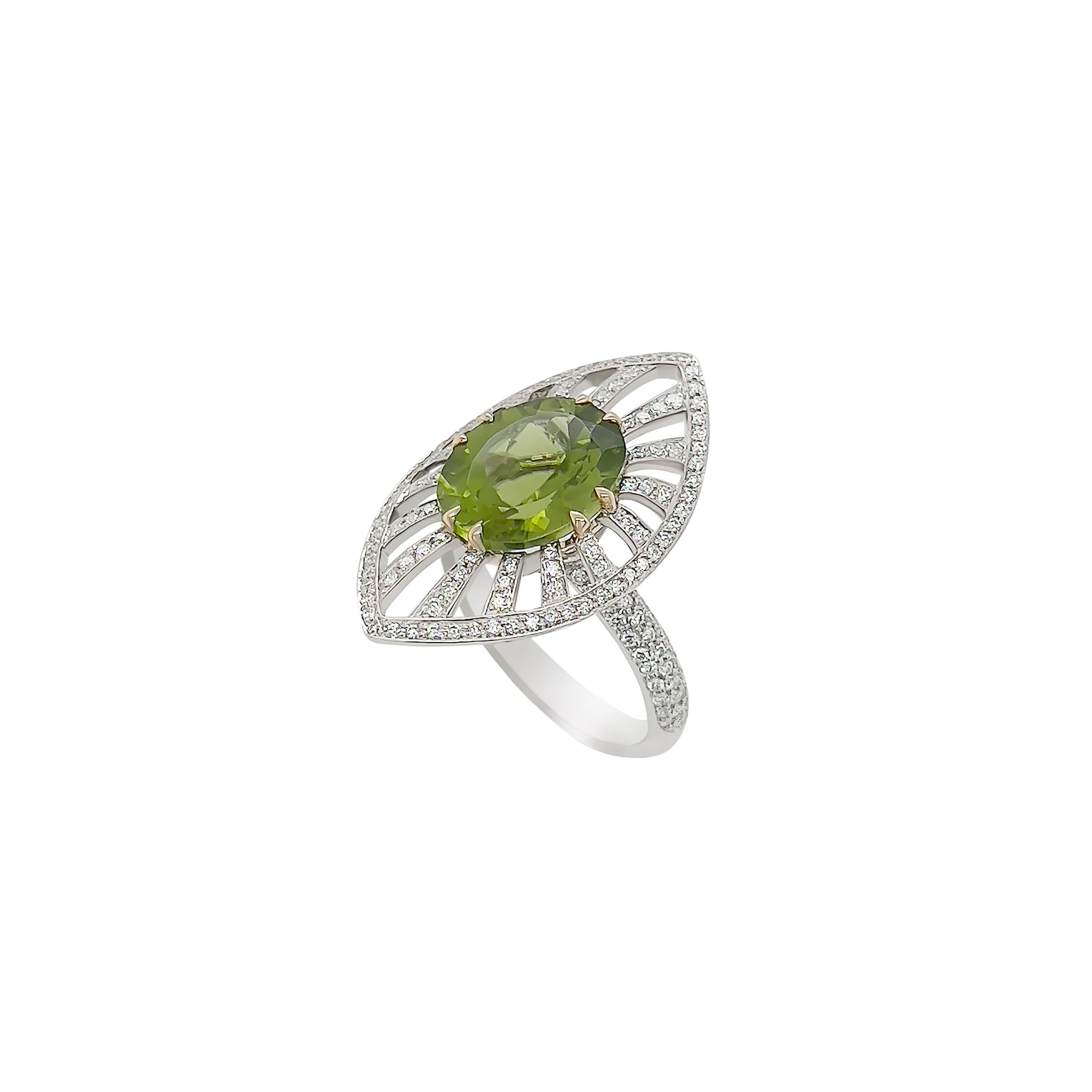 This sparkling 5.15ct oval peridot is a natural completely eye clean stone. The vivid green peridot is paired with a white diamond shield. The diamonds are high quality G VS color for the most brilliance. 

Thing ring is a part of a set with