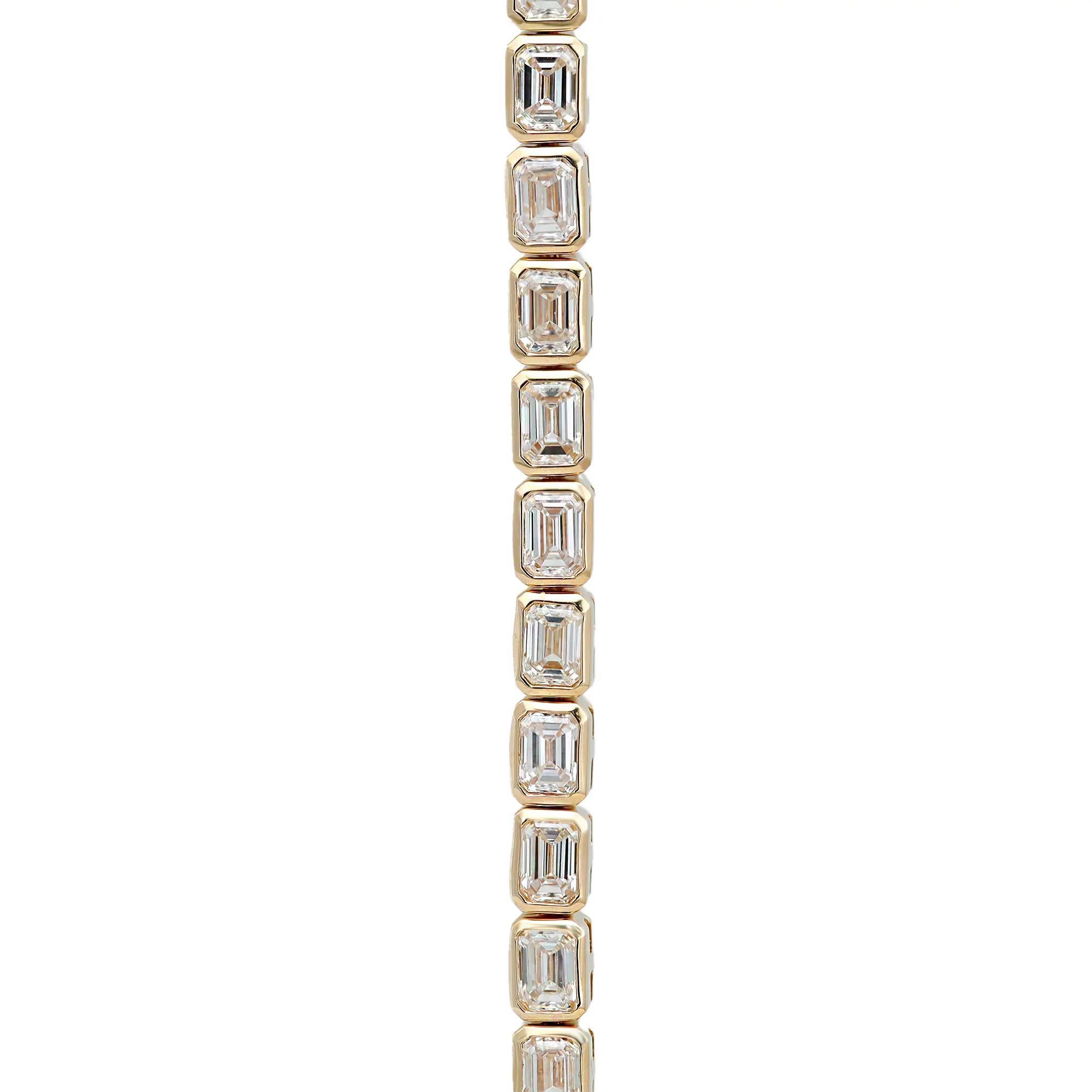 Modern 5.16 Carat Emerald Cut Diamond East-West Bezel Tennis Bracelet 18K Yellow Gold For Sale