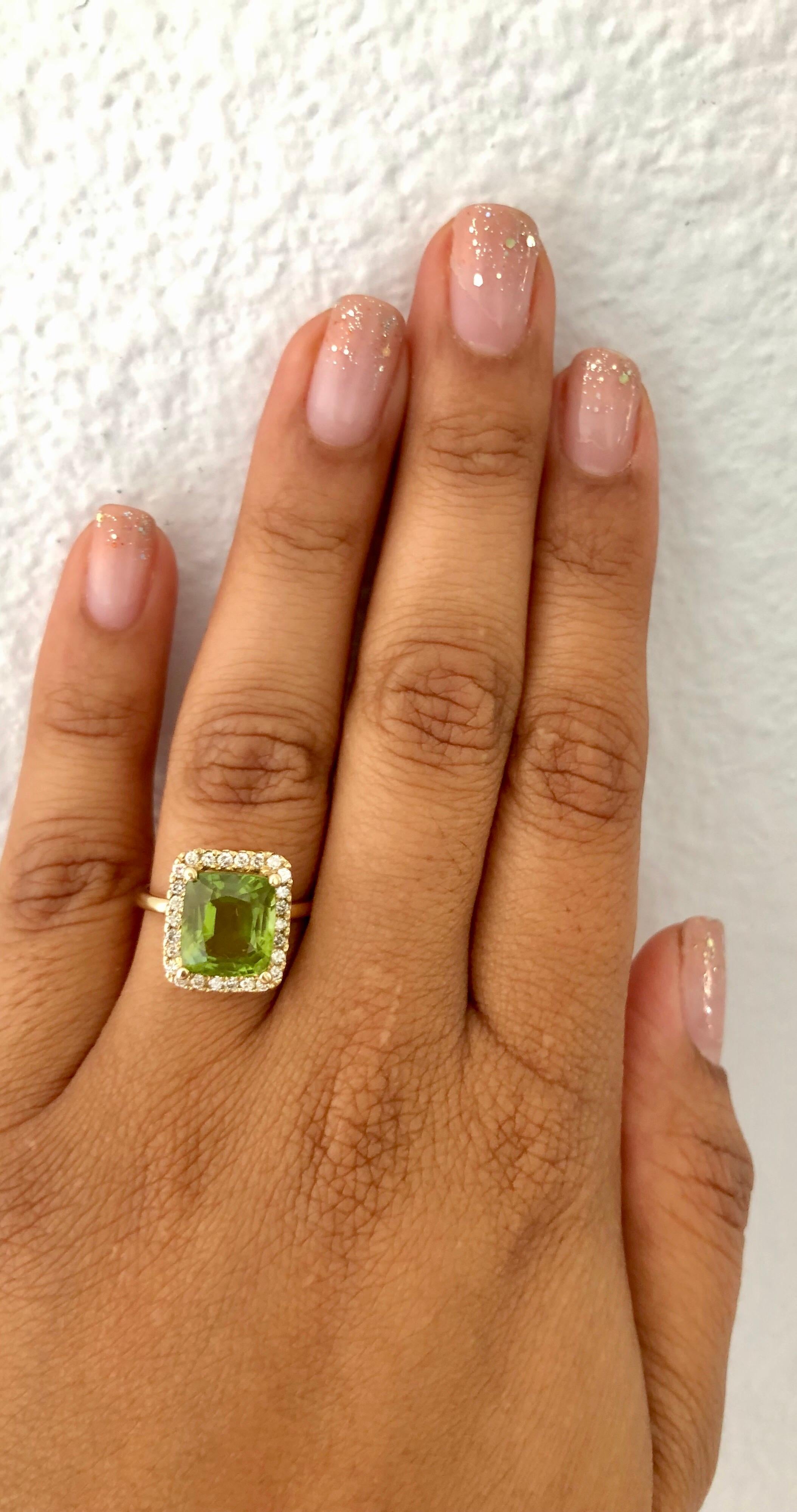 Emerald Cut 5.16 Carat Peridot Diamond 14 Karat Yellow Gold Ring For Sale