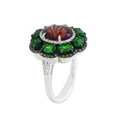 5.16 cts of Tsavorite and Spinel and 0.5 cts of Diamond Ring