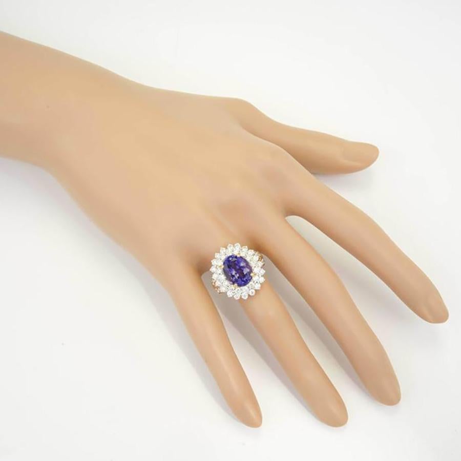 5.17 Carat Oval Purple Blue Tanzanite Diamond Halo Gold Cluster Cocktail Ring In Good Condition For Sale In Stamford, CT