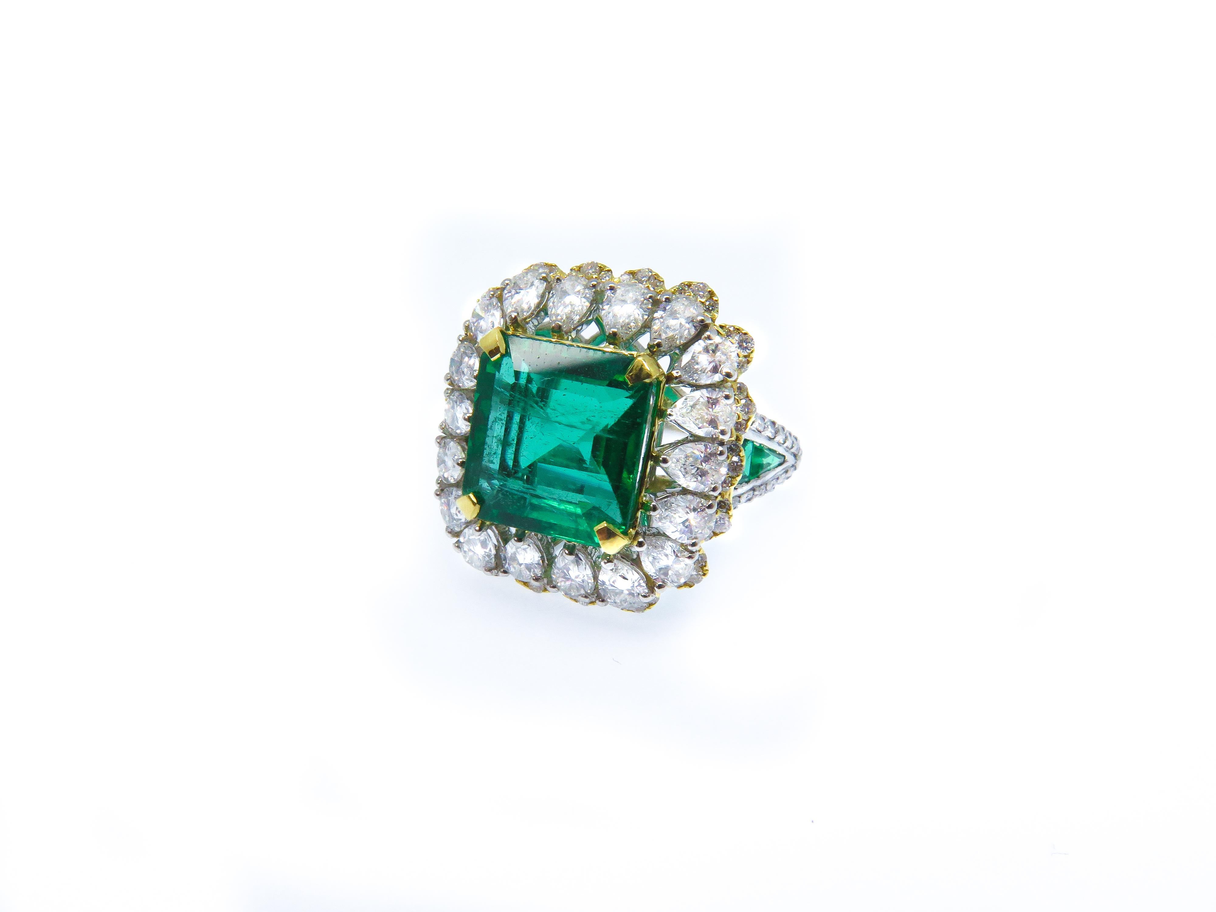 Emerald is highly valued for its deep bright green color, transparency and rather high hardness. It has maintained, along with diamond and ruby, the dominant position among gemstones since ancient times.

This unique ring features a 5.18 carat