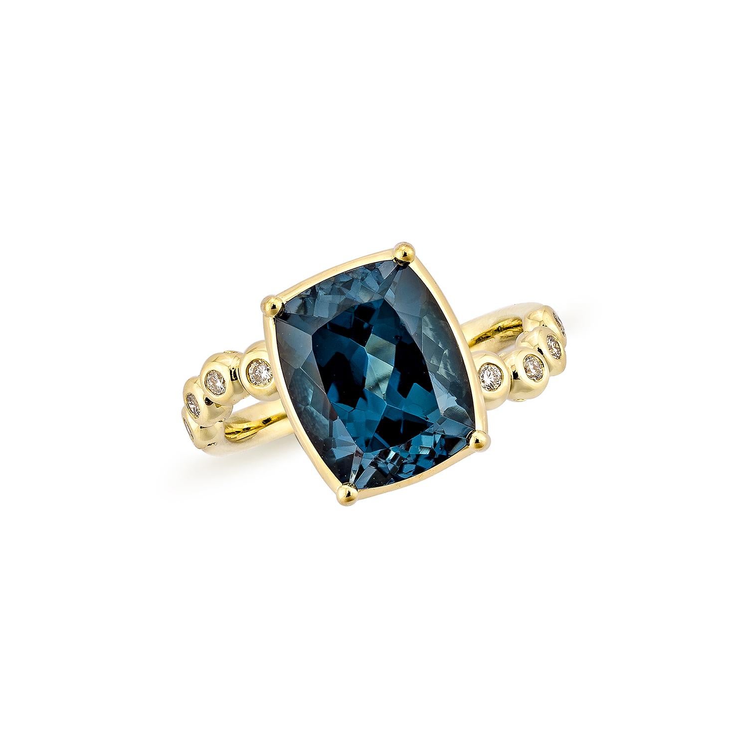 Contemporary 5.18 Carat London Blue Topaz Fancy Ring in 18Karat Yellow Gold with Diamond. For Sale
