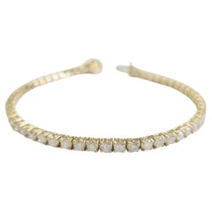 Bracciale tennis con diamanti naturali da 5,18 carati in oro giallo 14 carati