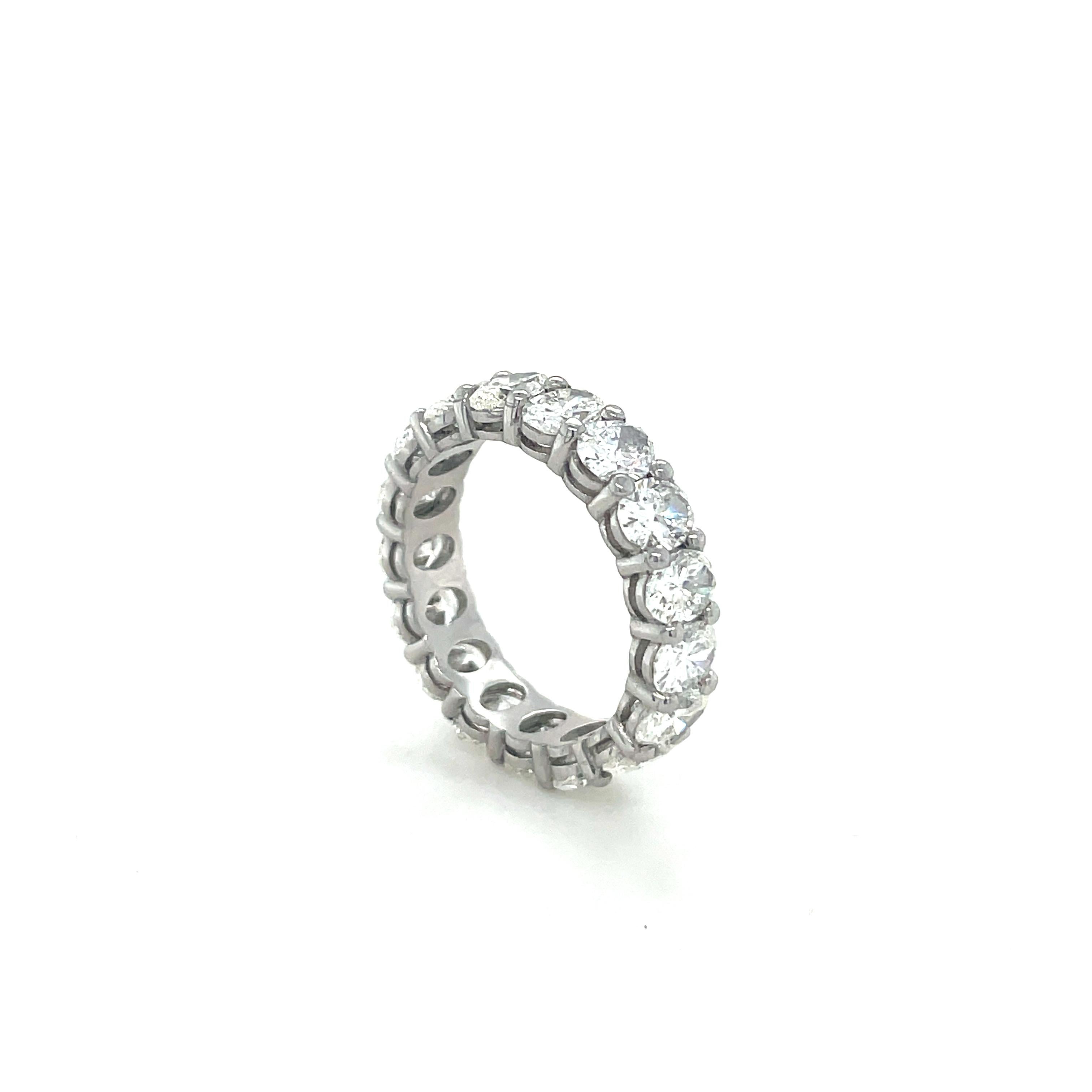 This gorgeous eternity band contains 17 oval brilliant cut diamonds weighing 5.18 carats total. Mounted in platinum and beautifully crafted, this ring is perfect for a wedding band or to add to your stack!

Ring size: 6
Stamp: PLAT
Gross weight: