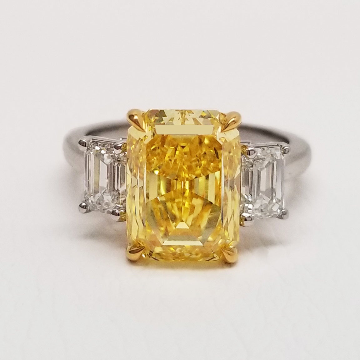 5.18 ct Emerald Cut Fancy Vivid Yellow Diamond 3 Stone Engagement Ring GIA 18k  For Sale
